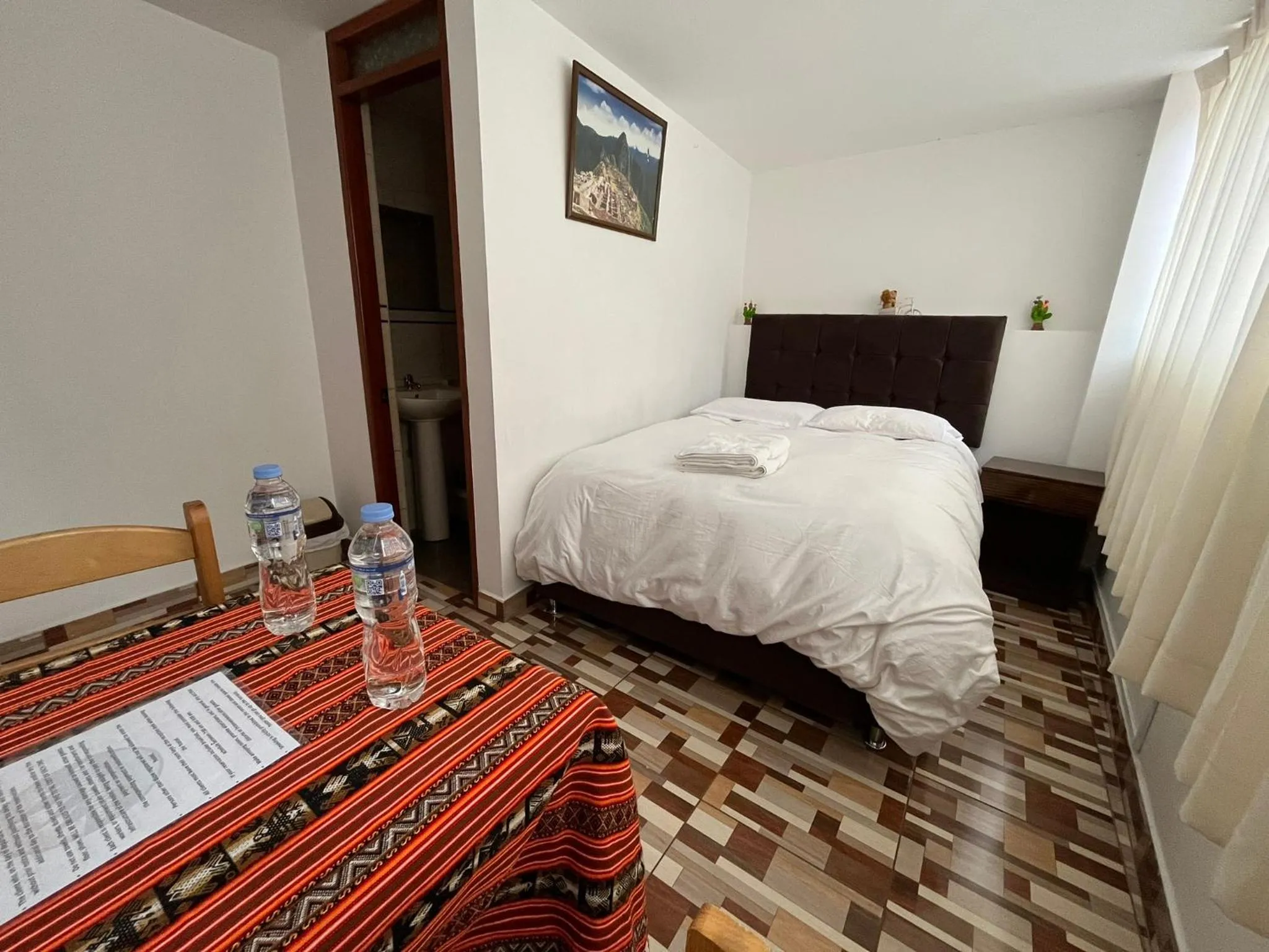 Bed in Hostal Apu Qhawarina