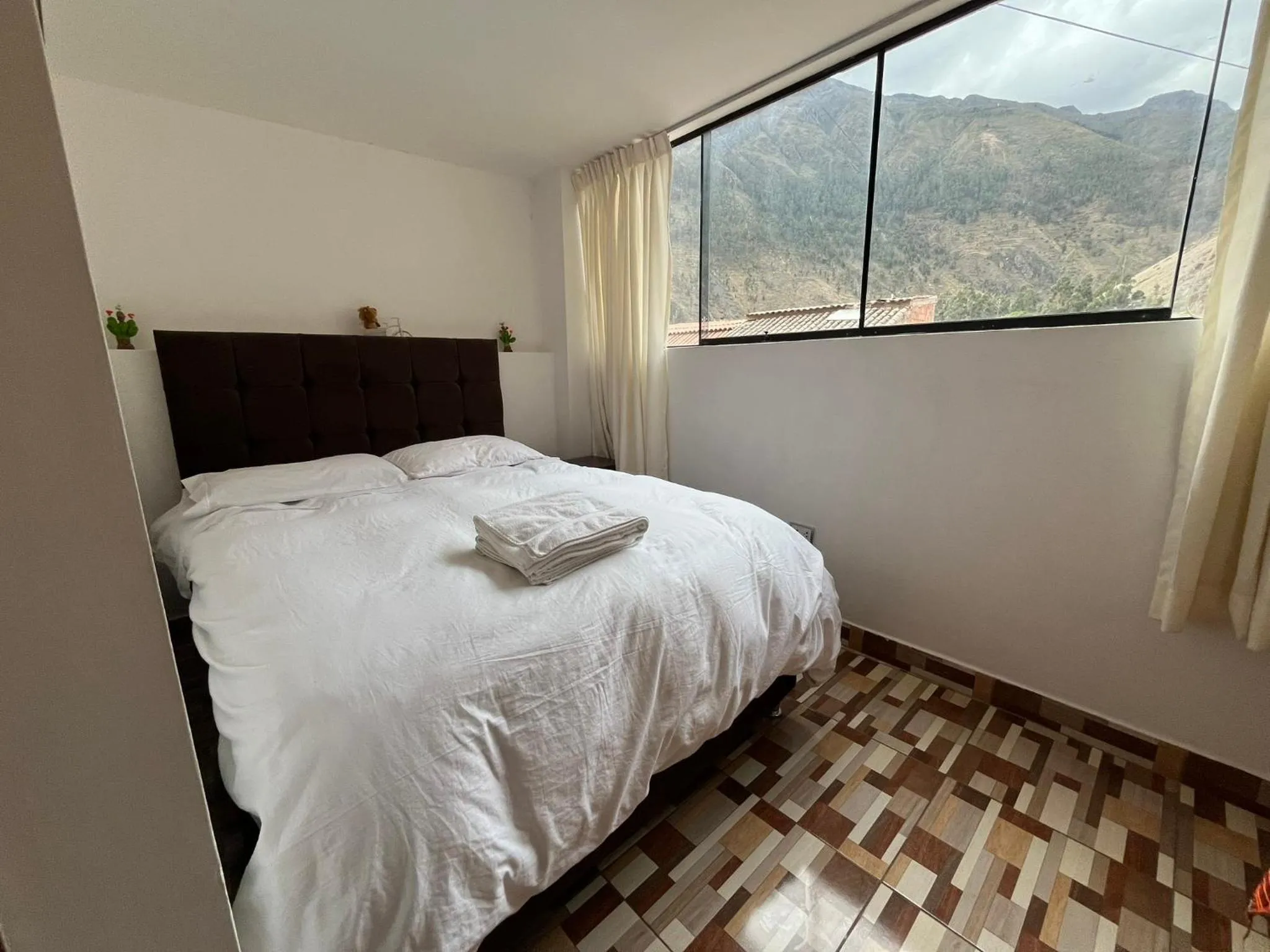 Bed in Hostal Apu Qhawarina