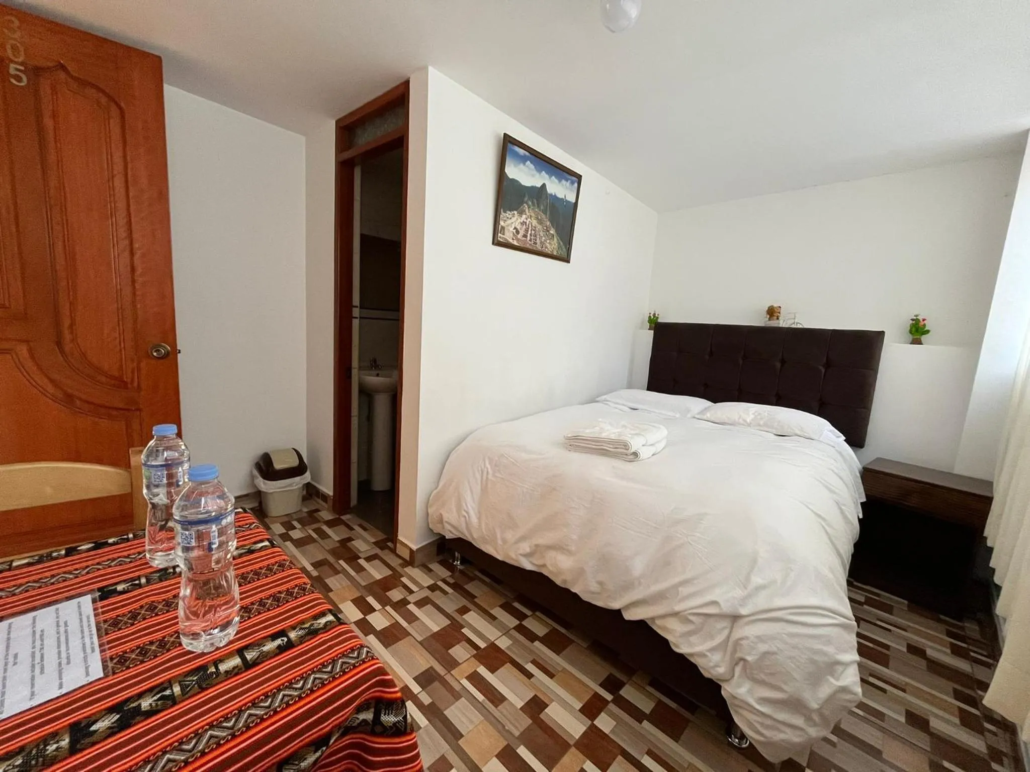 Bed in Hostal Apu Qhawarina