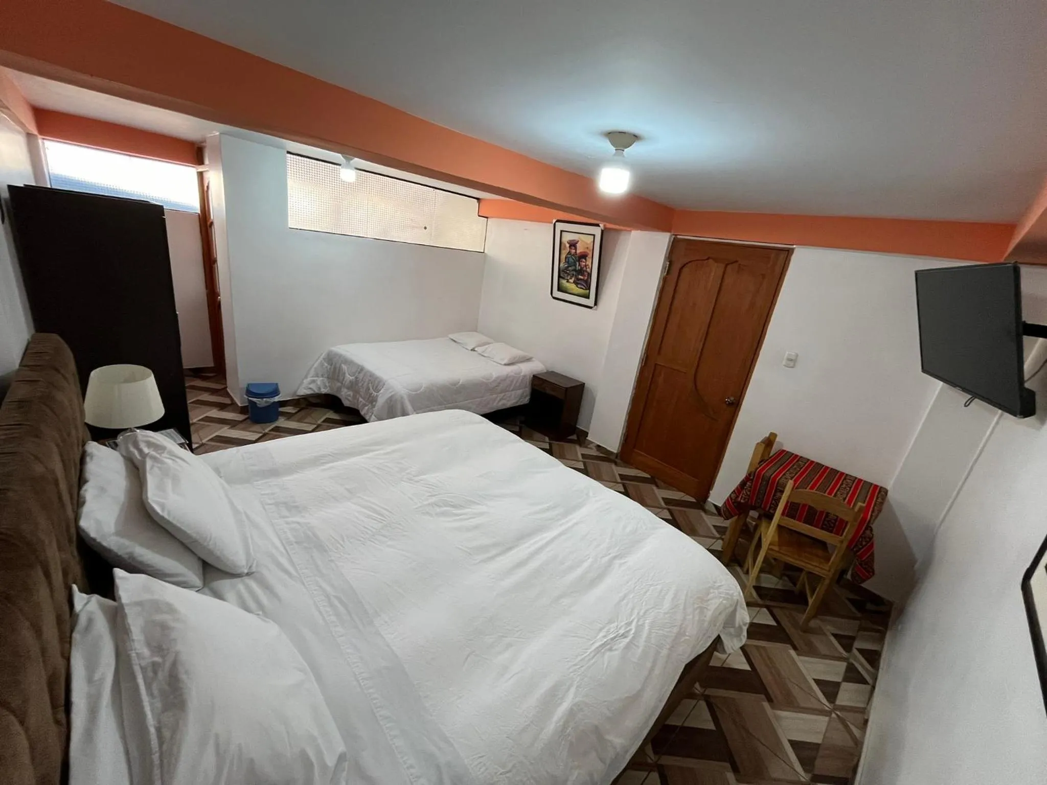 Bed in Hostal Apu Qhawarina