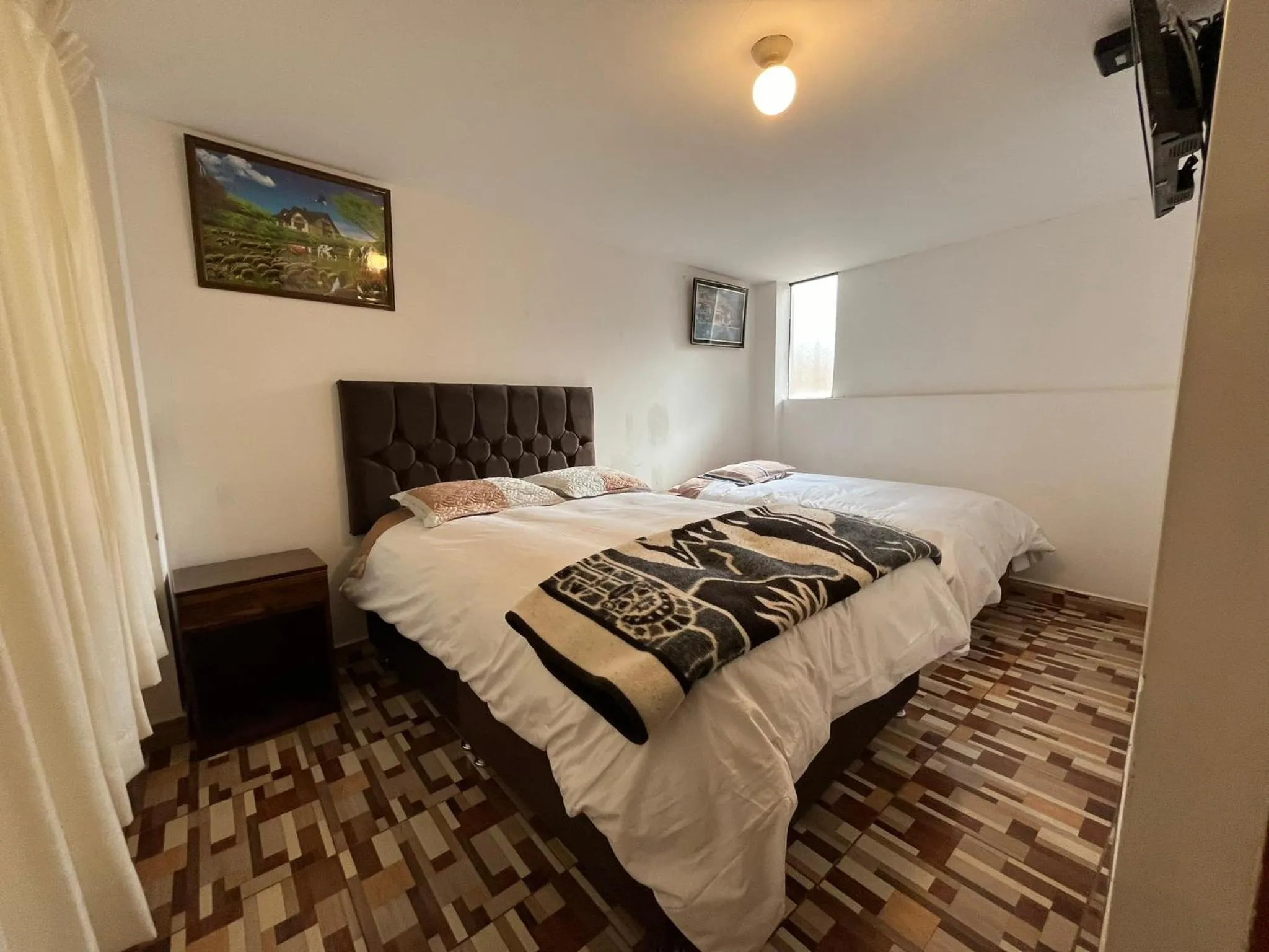 Bed in Hostal Apu Qhawarina