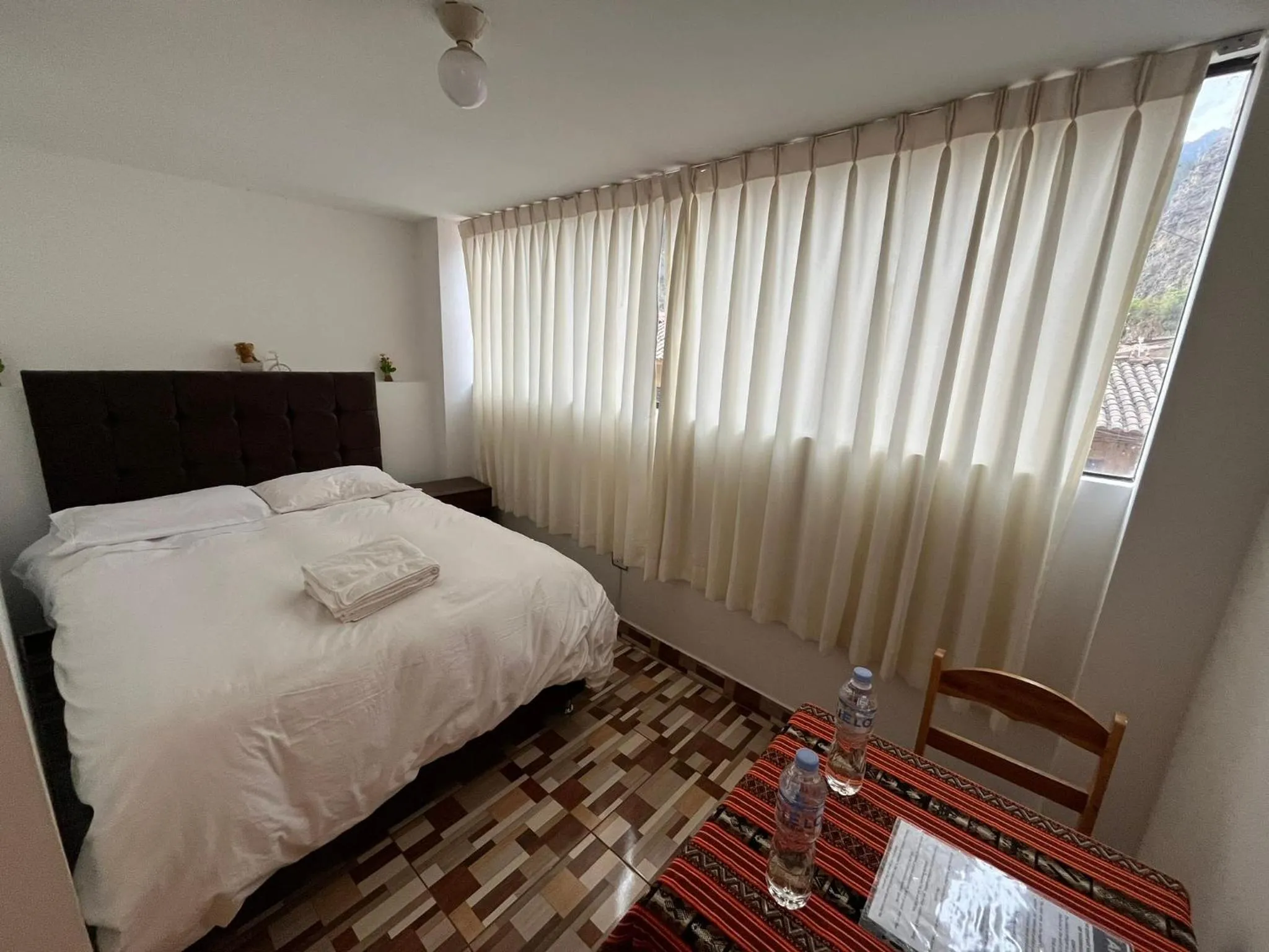 Bed in Hostal Apu Qhawarina