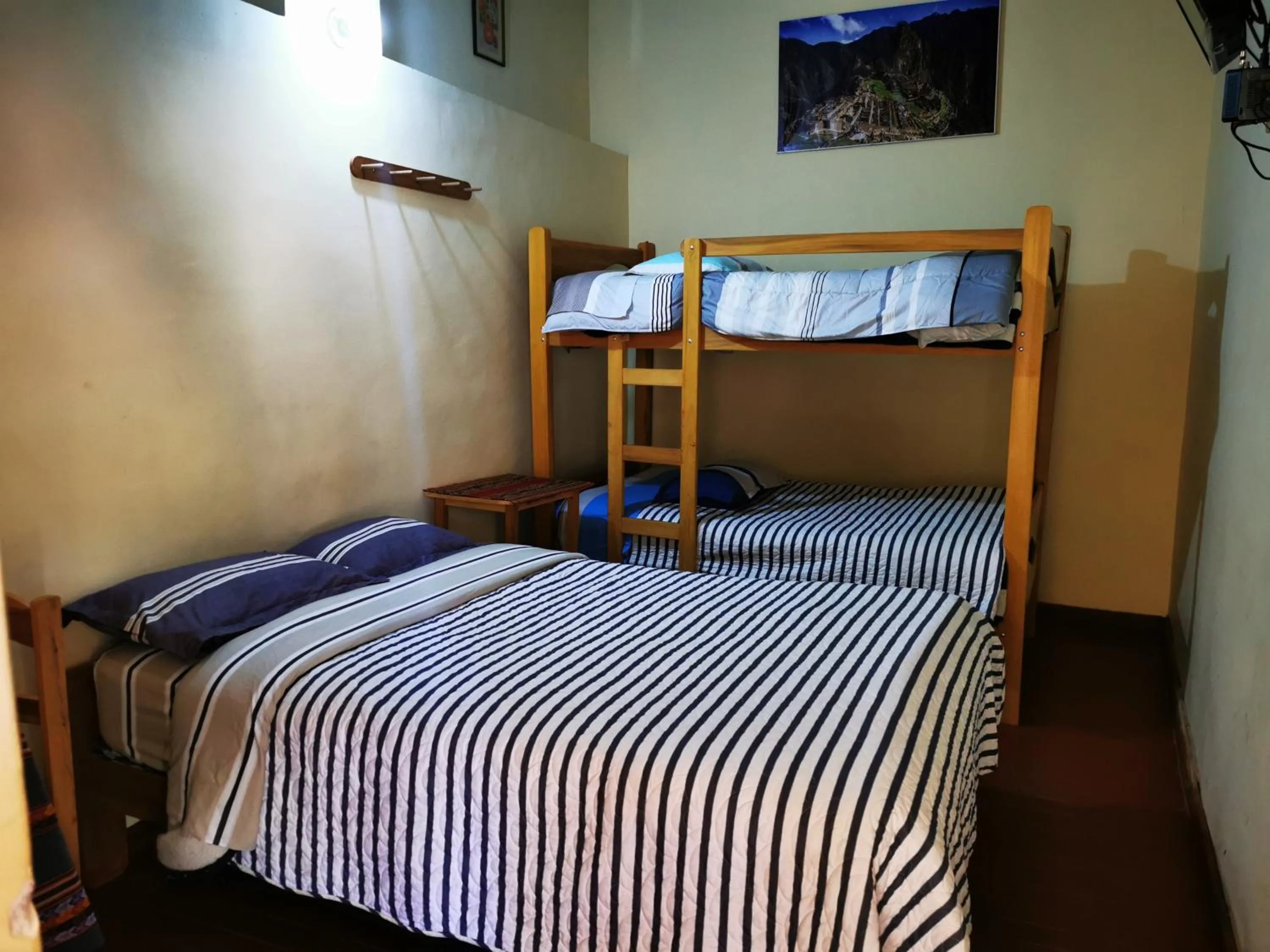 Bed in Hostal Apu Qhawarina