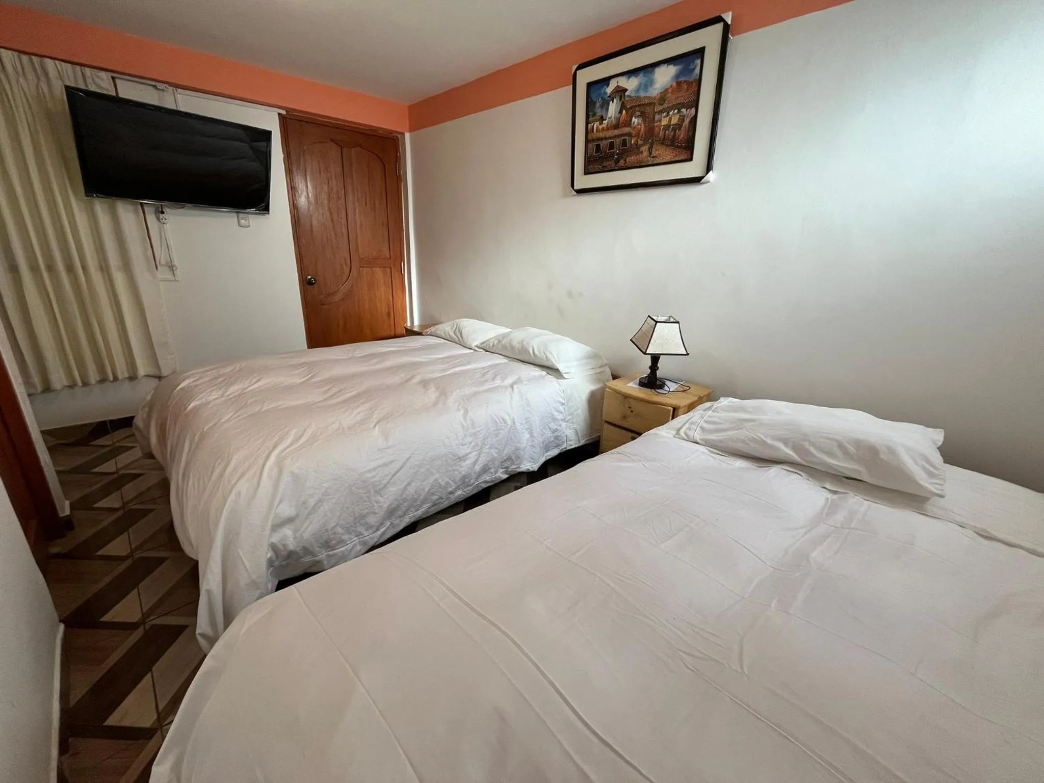 Bed in Hostal Apu Qhawarina