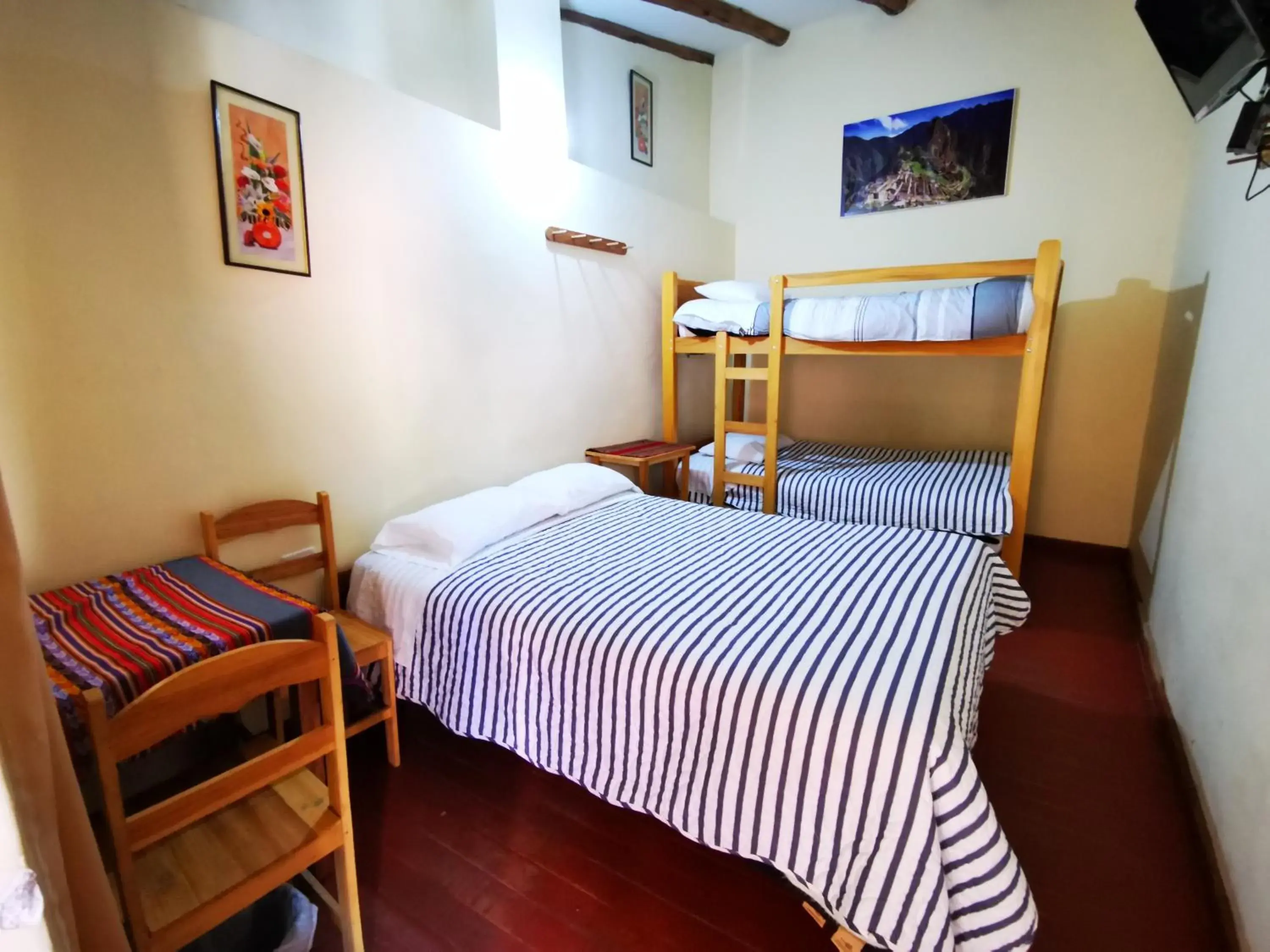 Economy Triple Room with Shared Bathroom in Hostal Apu Qhawarina Economy Triple Room with Shared Bathroom in Hostal Apu Qhawarina