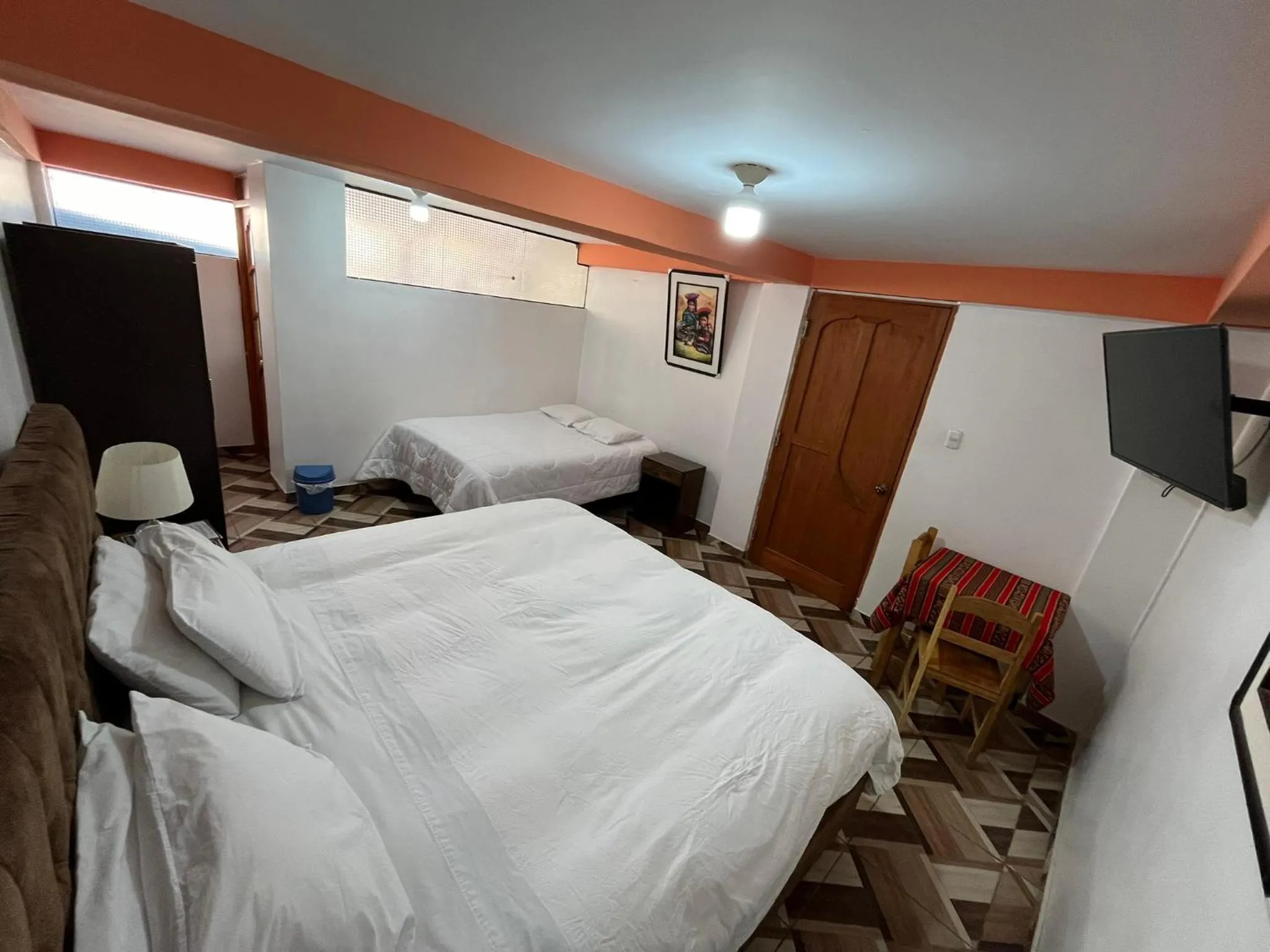 Bed in Hostal Apu Qhawarina