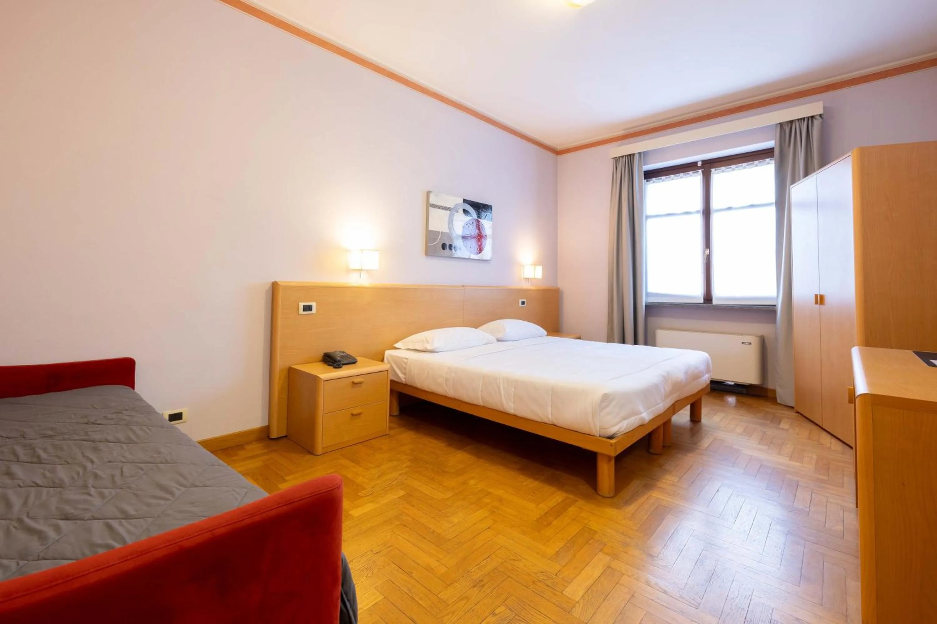 Bed in Hotel La Fertè