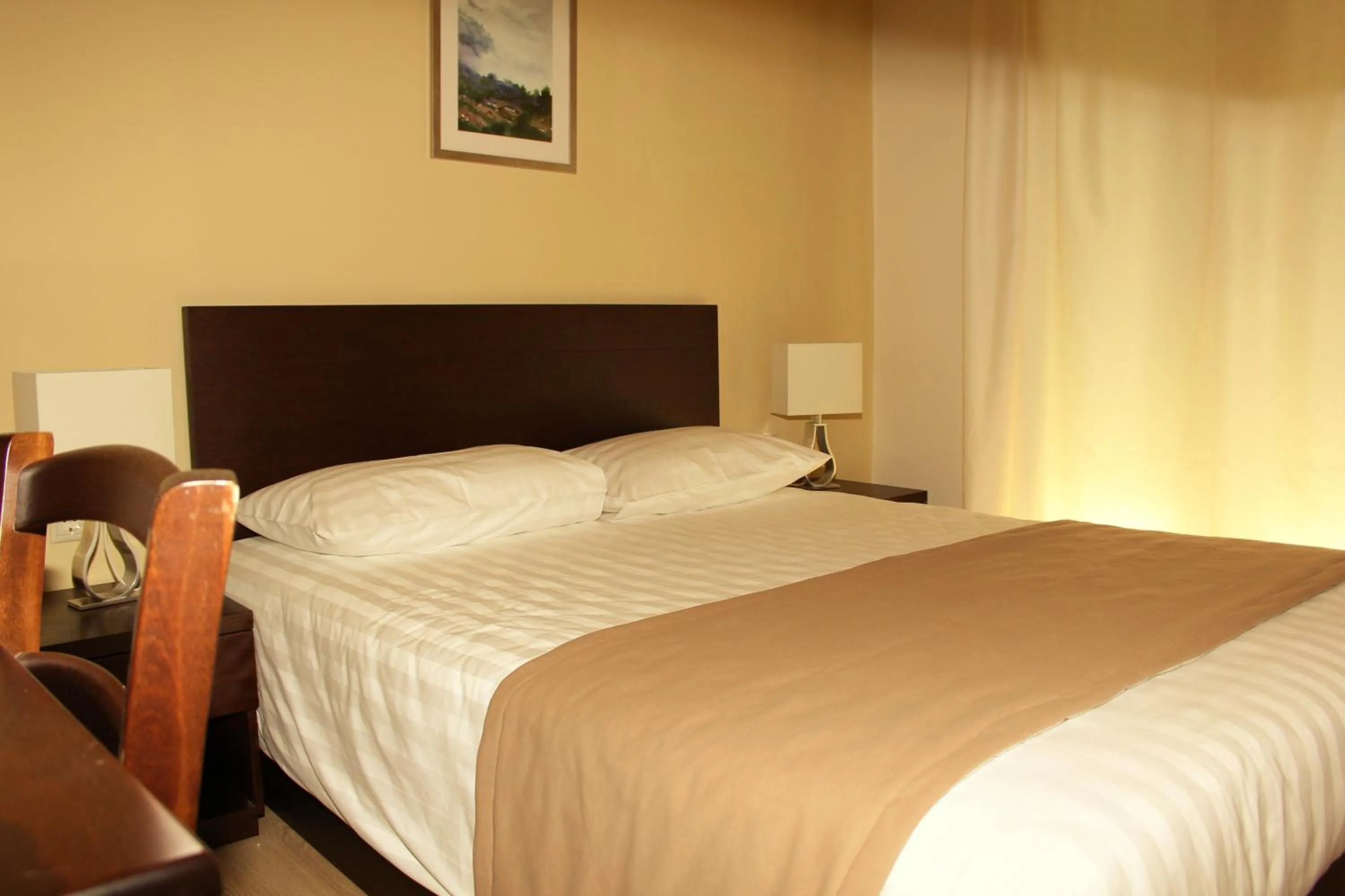 Bedroom in Rea Hotel