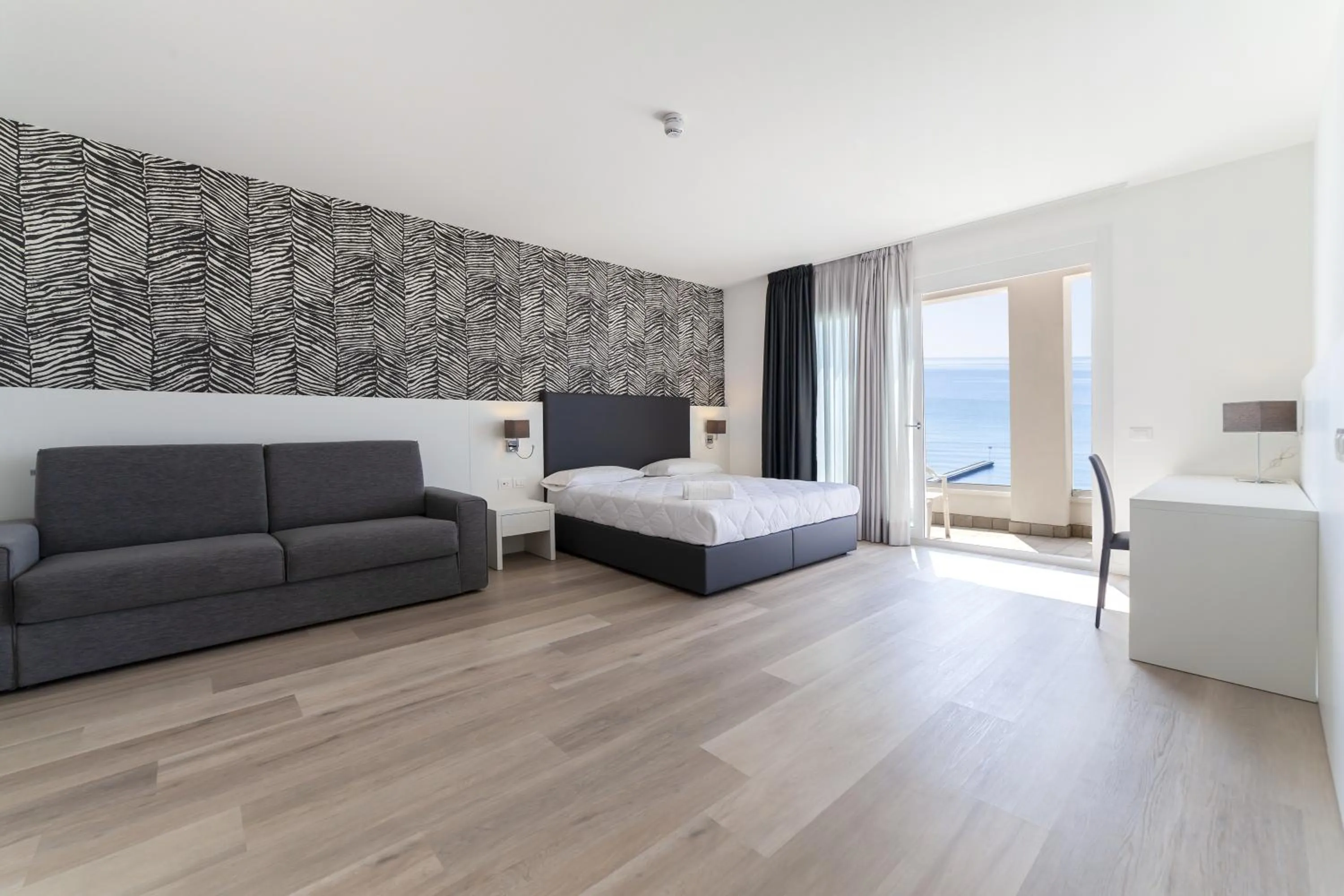 Bed in Hotel Columbia & Ninfea