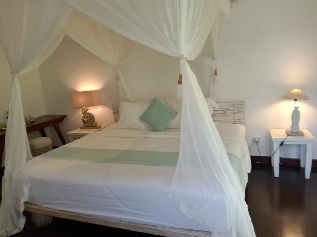 Bed in Rua Beach Resort Sumba