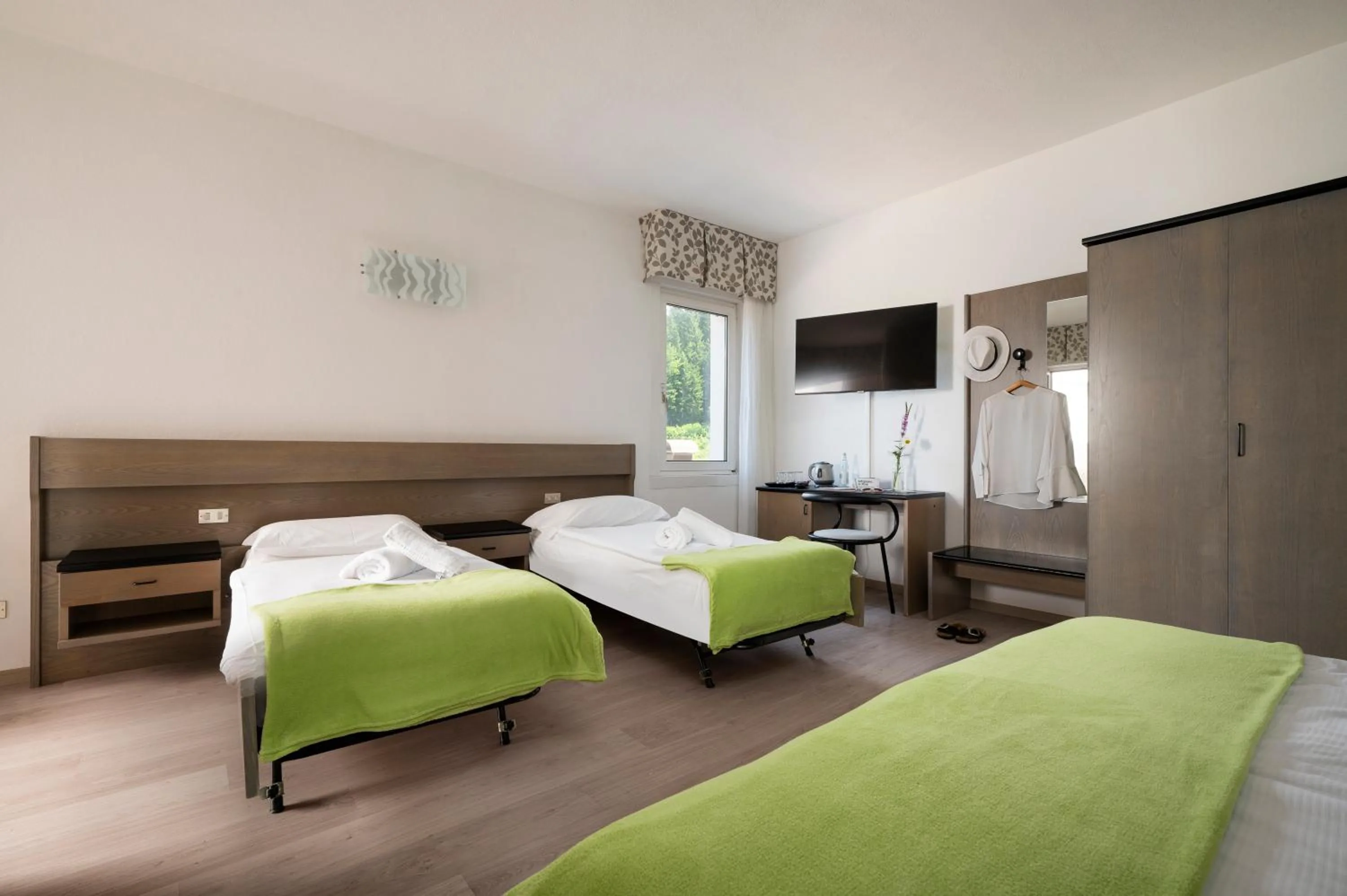 Bed in Hotel Scoiattolo