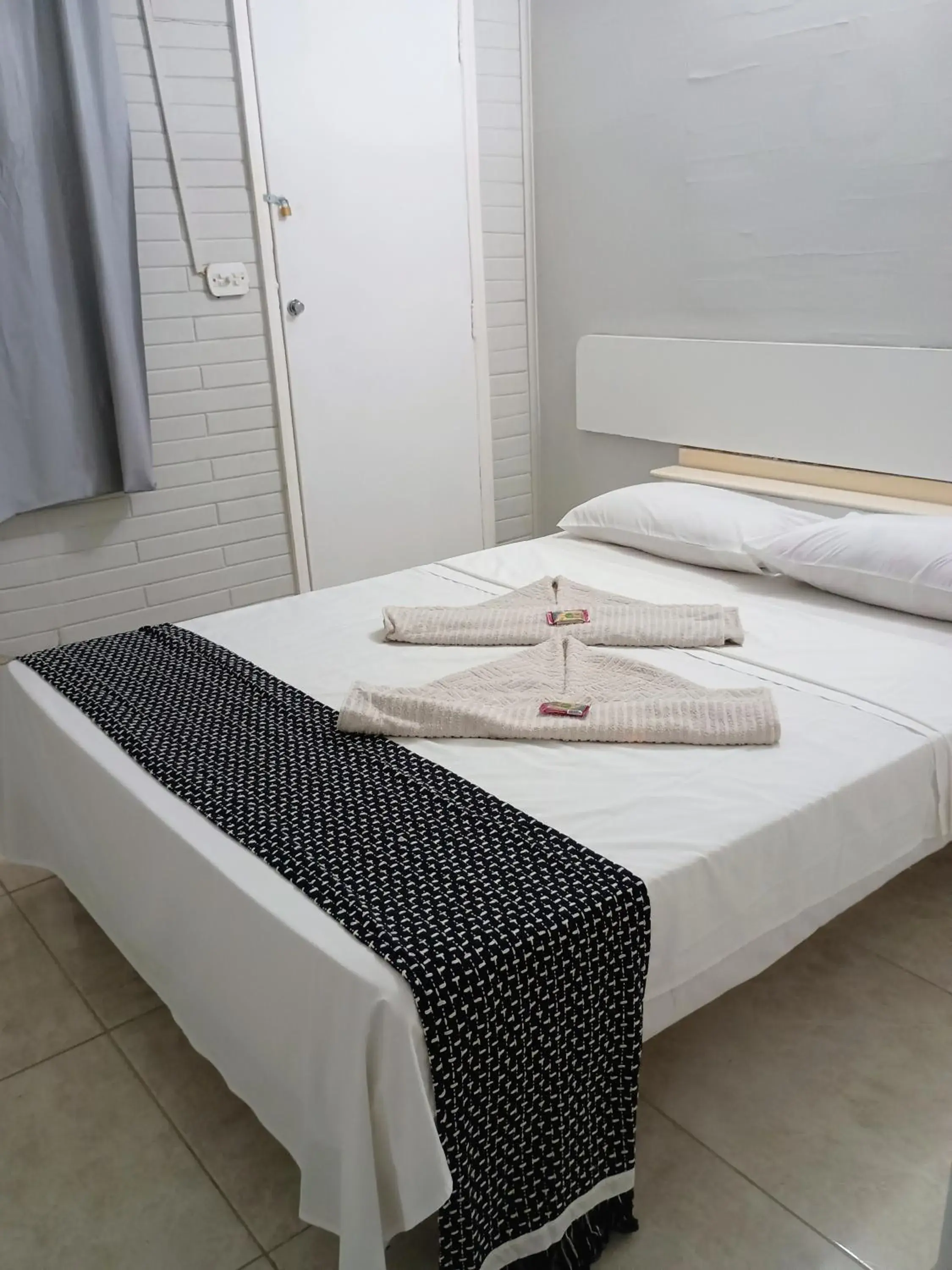 Bed in OYO Pousada Recanto Shangrilá, Cabo Frio Bed in OYO Pousada Recanto Shangrilá, Cabo Frio