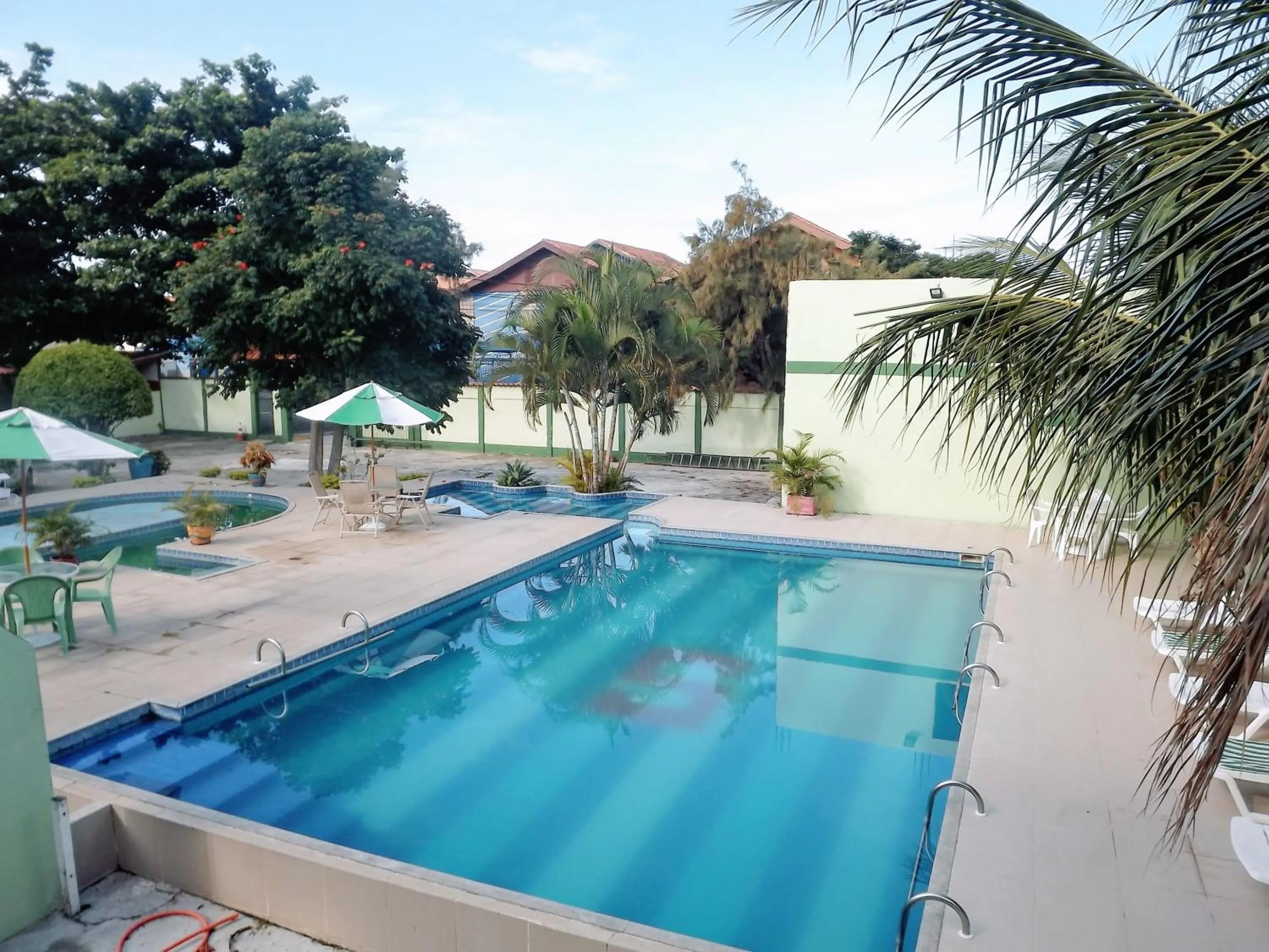 Swimming pool in OYO Pousada Recanto Shangrilá, Cabo Frio