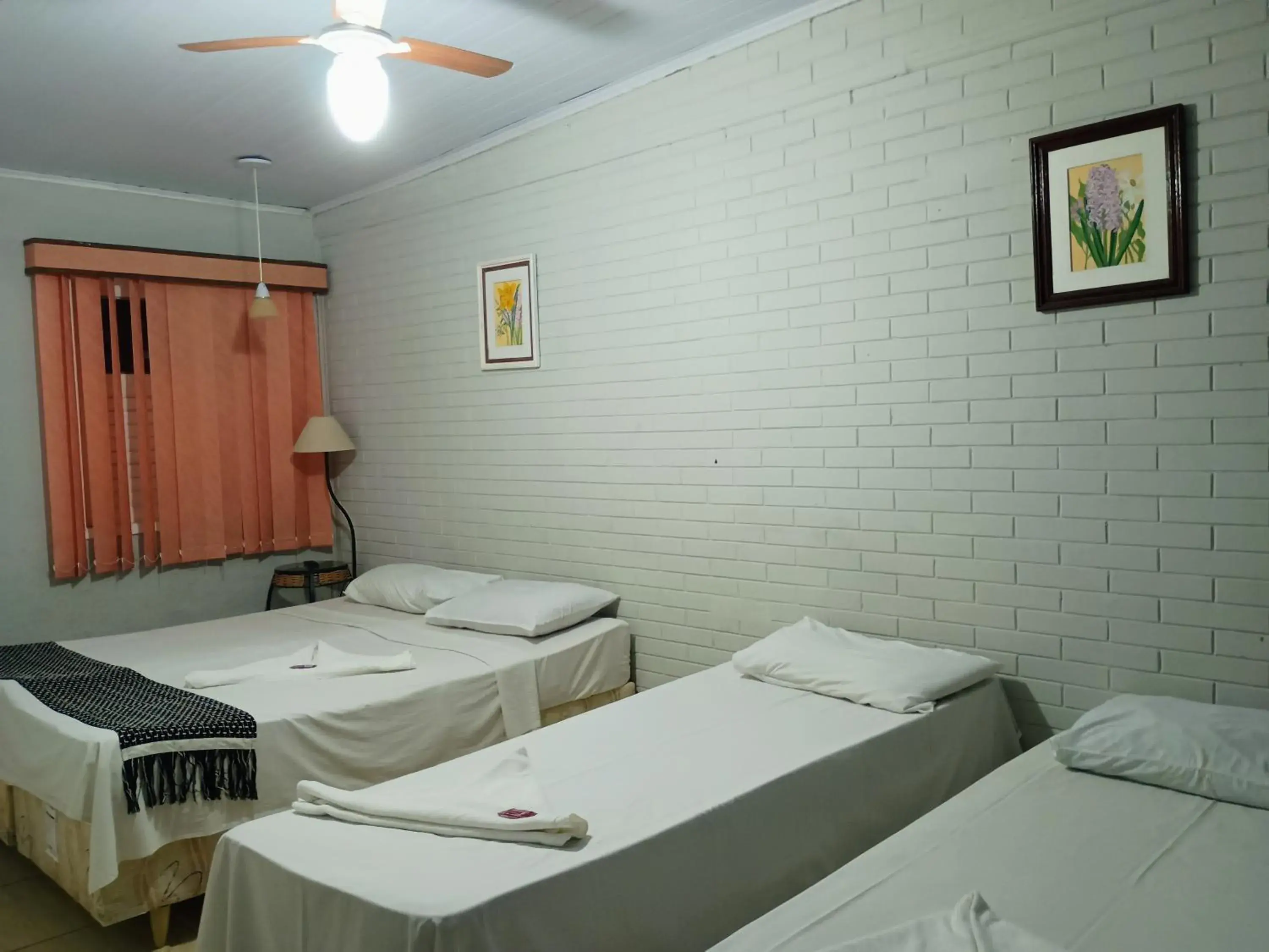 Bed in OYO Pousada Recanto Shangrilá, Cabo Frio Bed in OYO Pousada Recanto Shangrilá, Cabo Frio