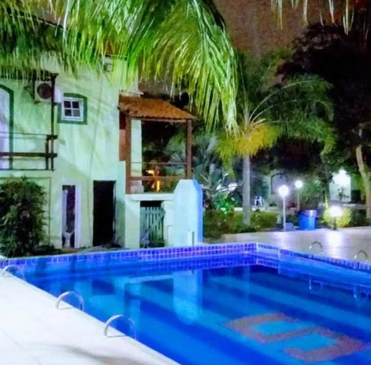 Swimming pool in OYO Pousada Recanto Shangrilá, Cabo Frio