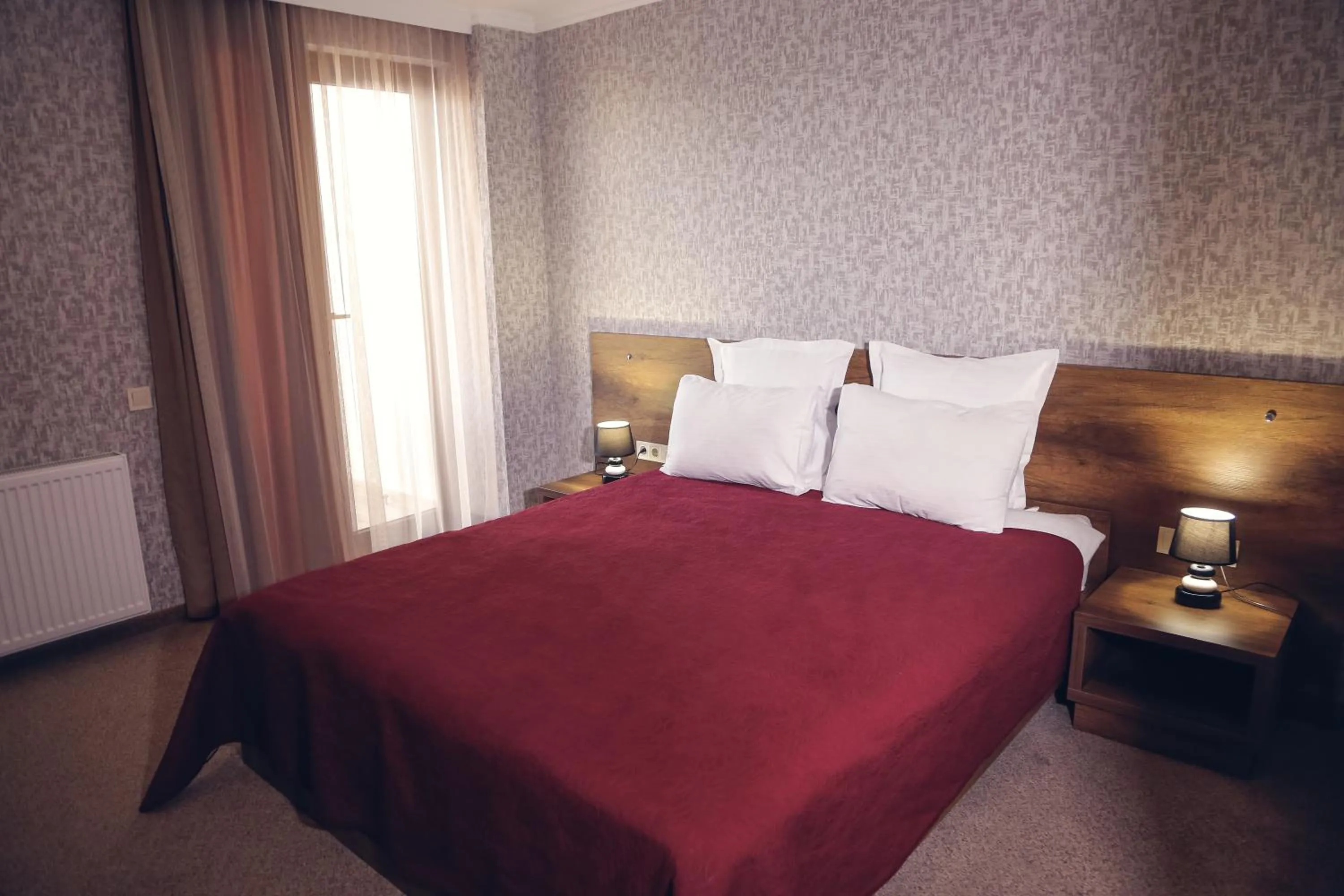 Bed in Hotel King David The Builder