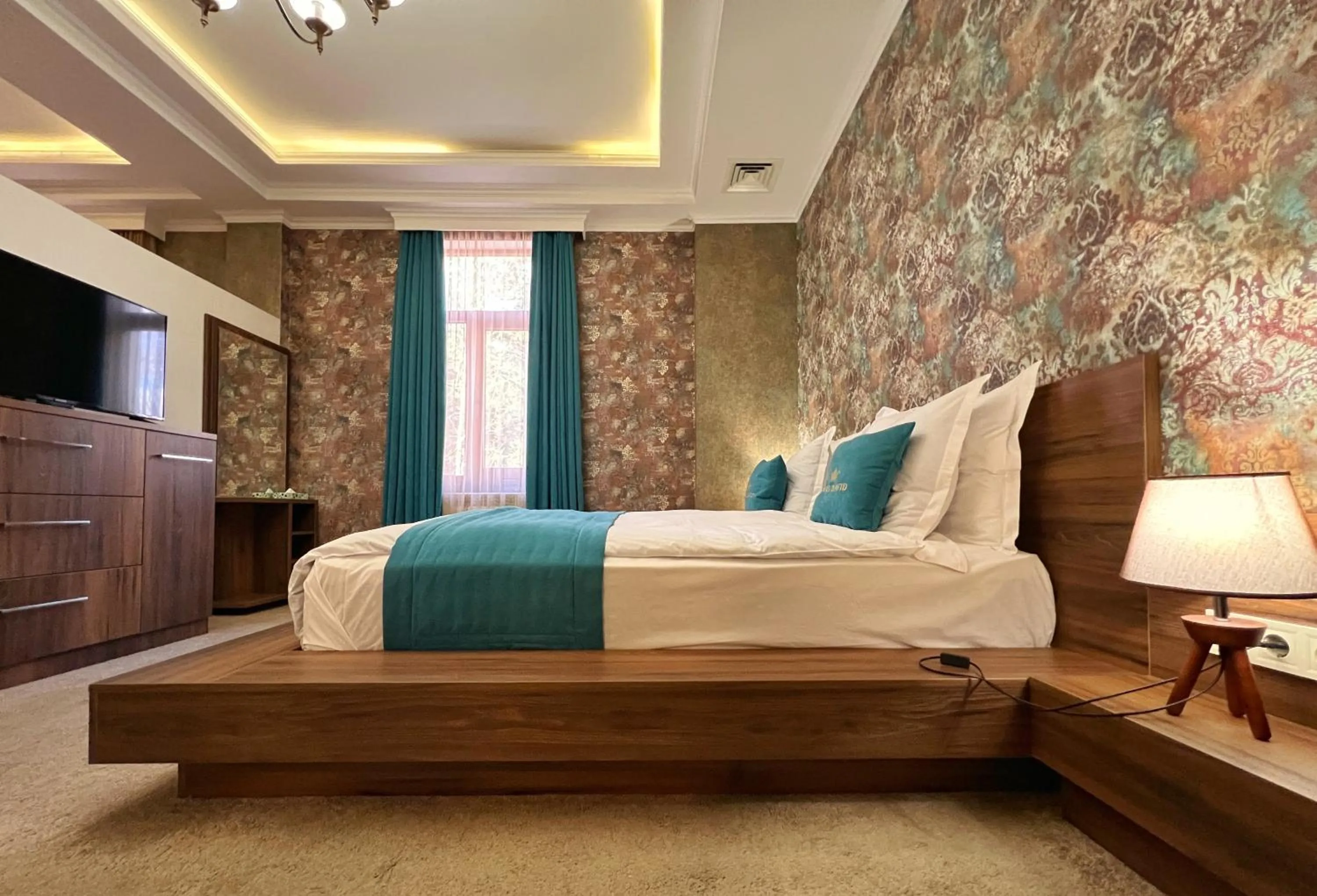 Communal lounge/ TV room, Bed in Hotel King David The Builder