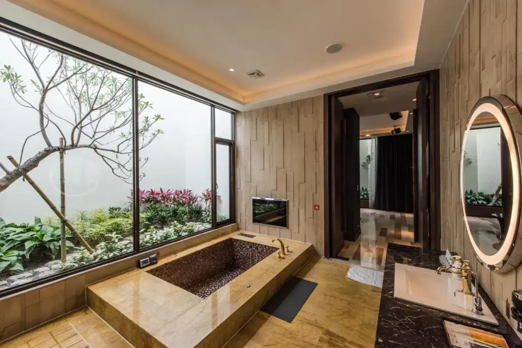 Garden view, Bed in Green Palm Motel Garden view, Bed in Green Palm Motel