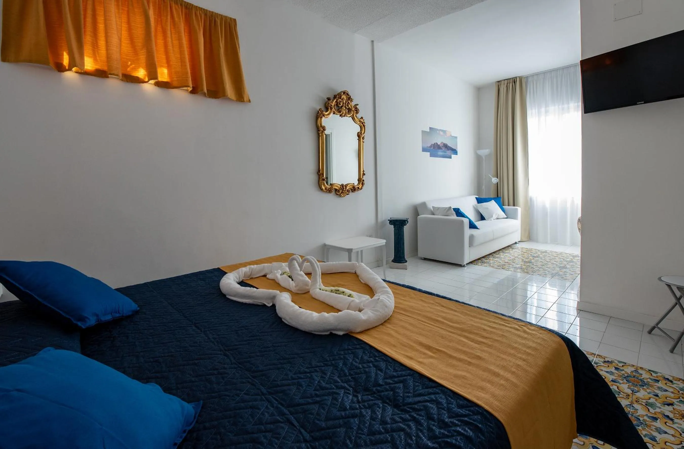 Bedroom in Sunset rooms