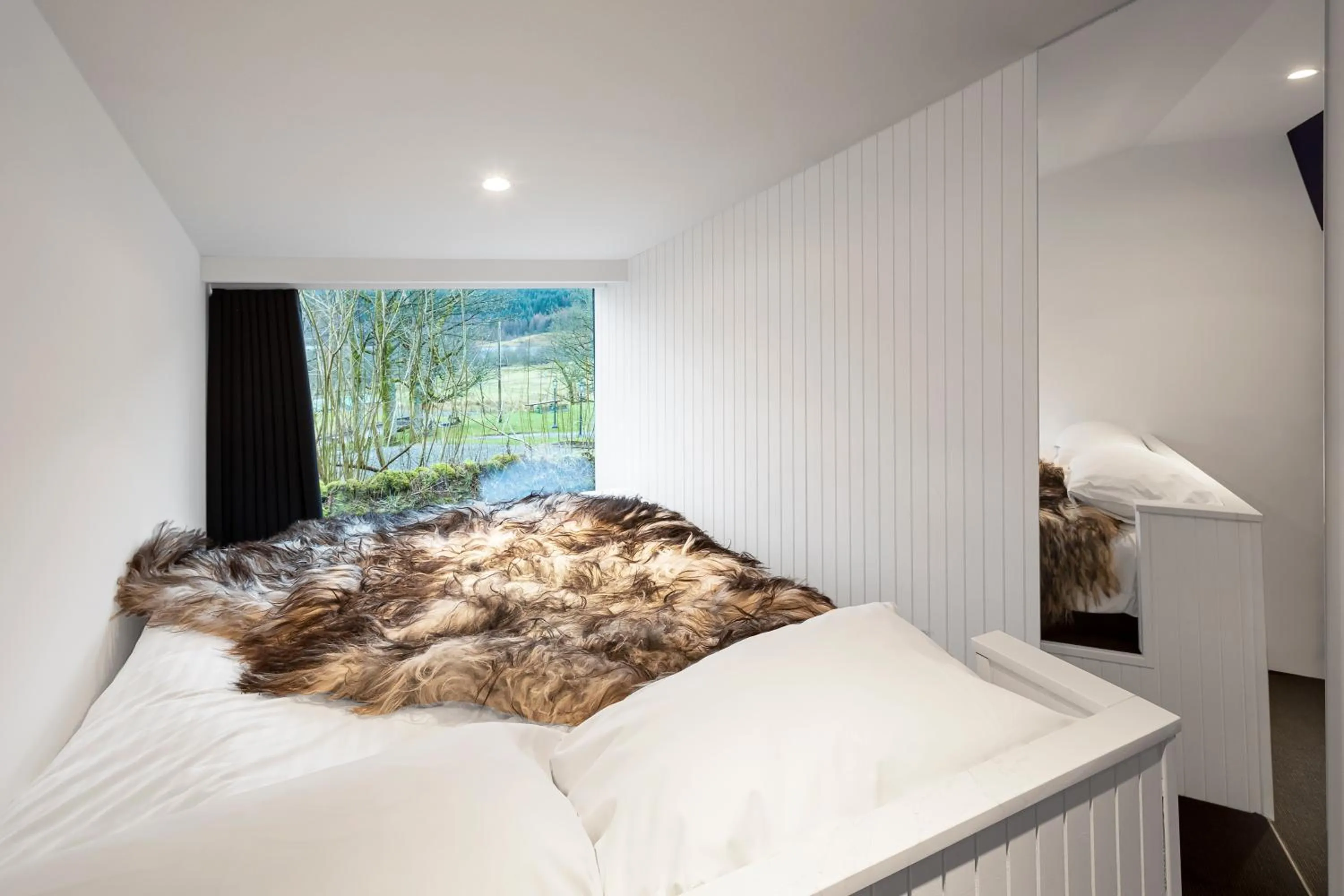 Bed in Monachyle Mhor Hotel