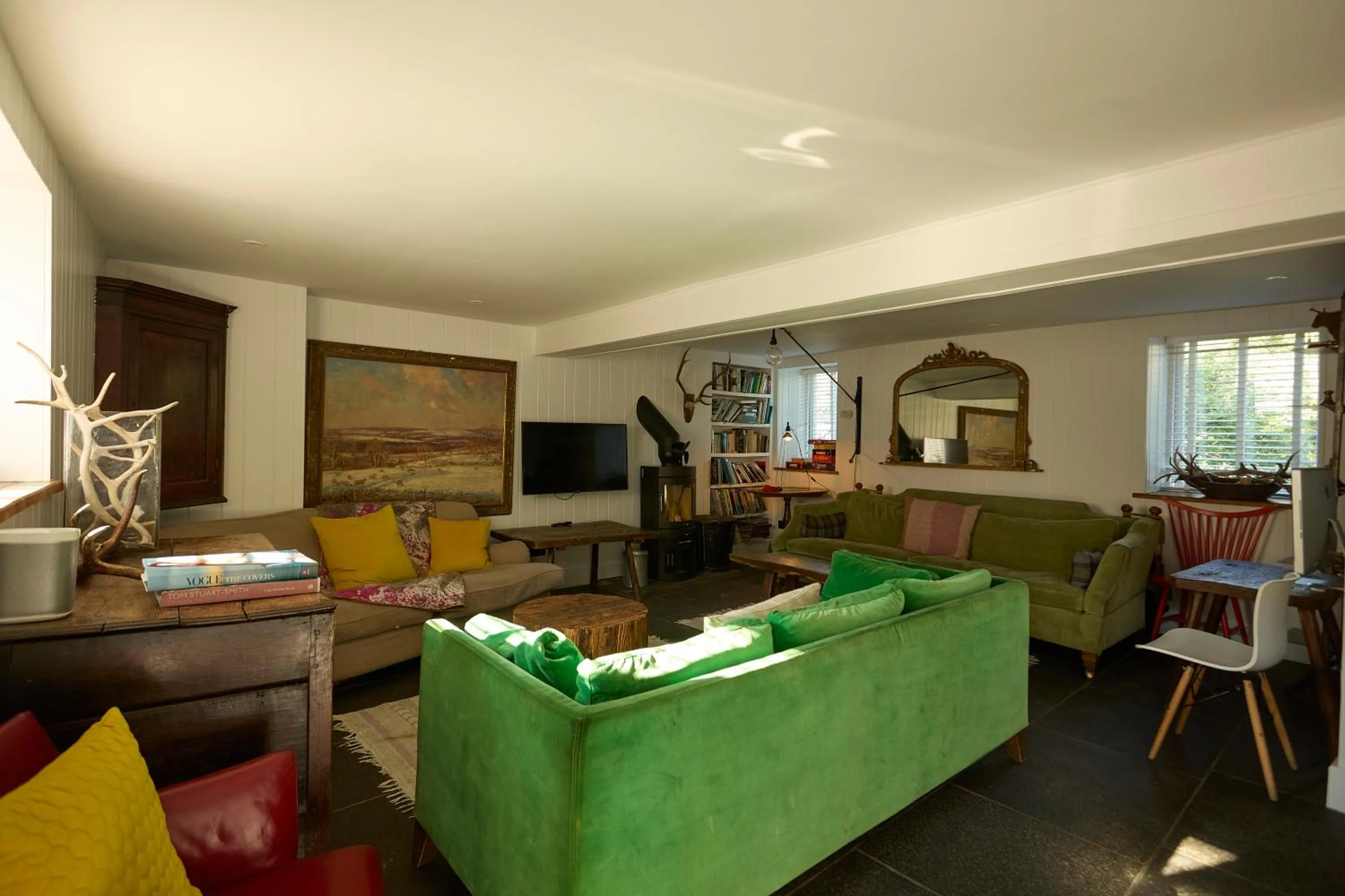 Communal lounge/ TV room in Monachyle Mhor Hotel