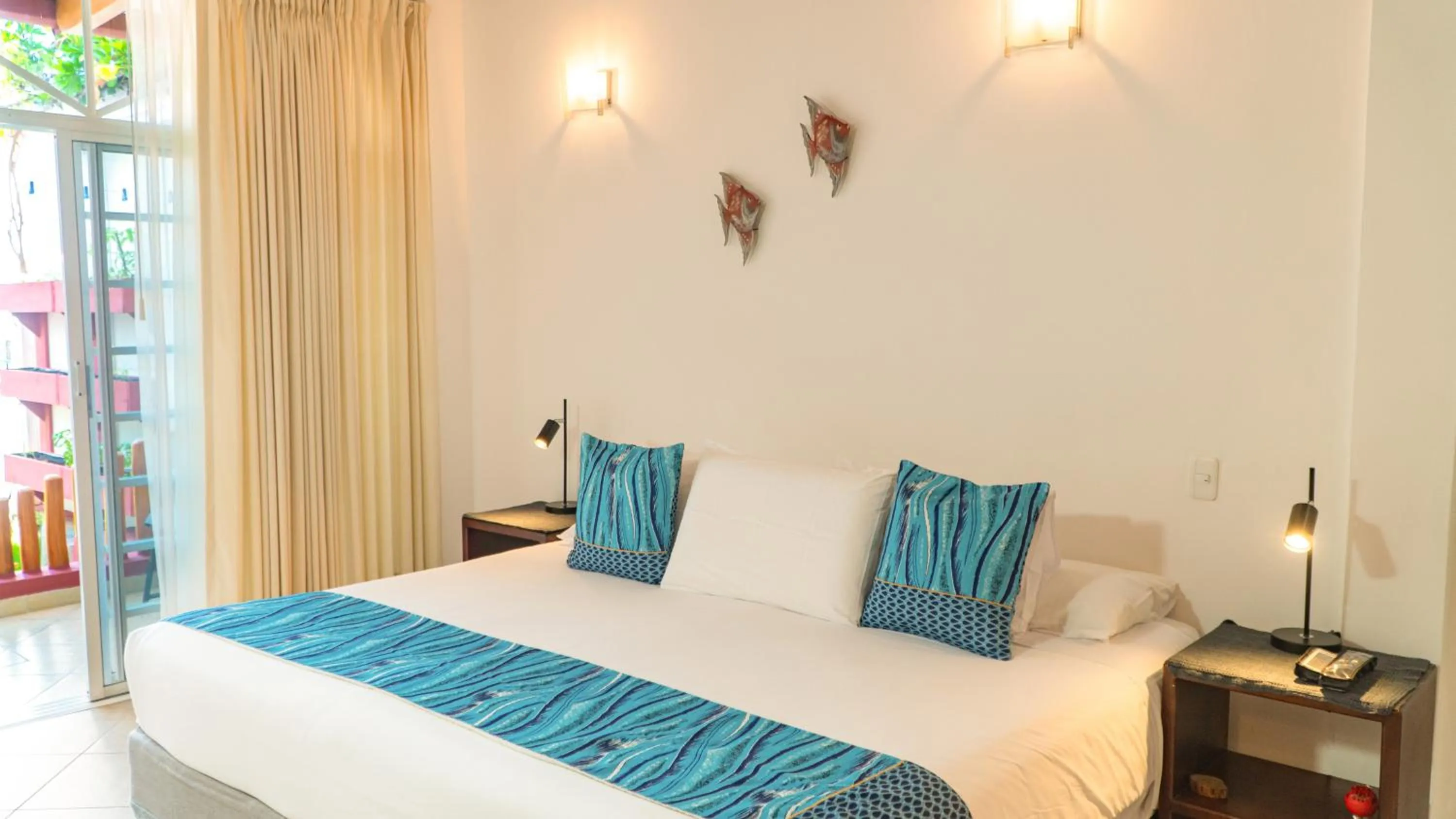 Bed in Hotel Galapagos Suites B&B