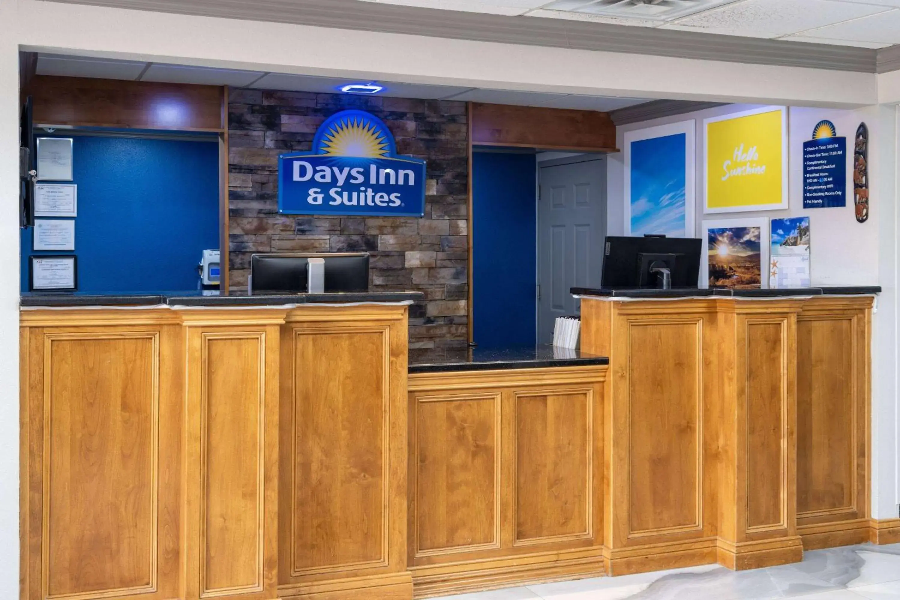 Lobby or reception in Days Inn & Suites by Wyndham Commerce Lobby or reception in Days Inn & Suites by Wyndham Commerce
