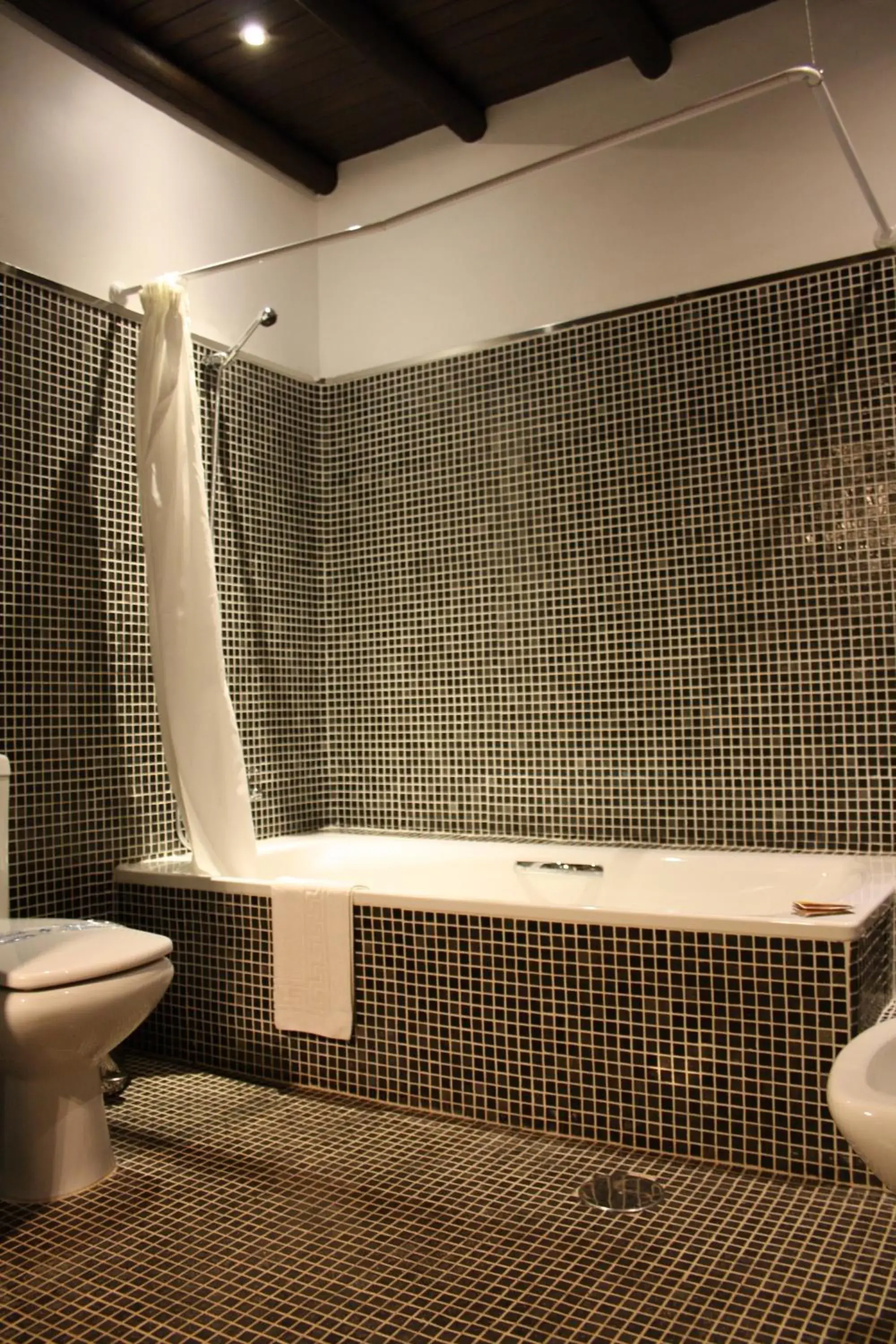 Bathroom in Apartamentos La Ciudad Bathroom in Apartamentos La Ciudad