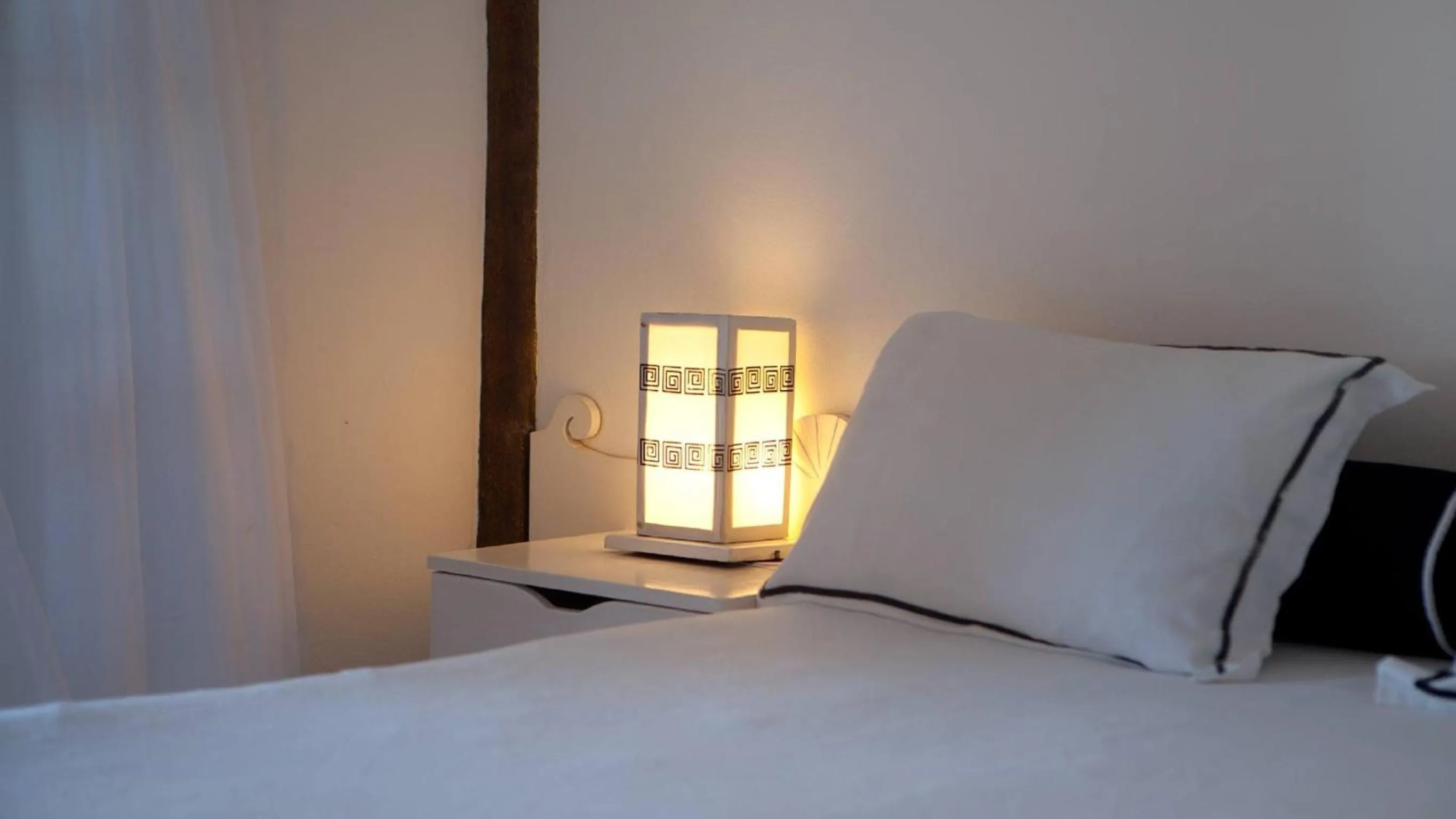 Bed in Bruno Marambaia Charme Hotel