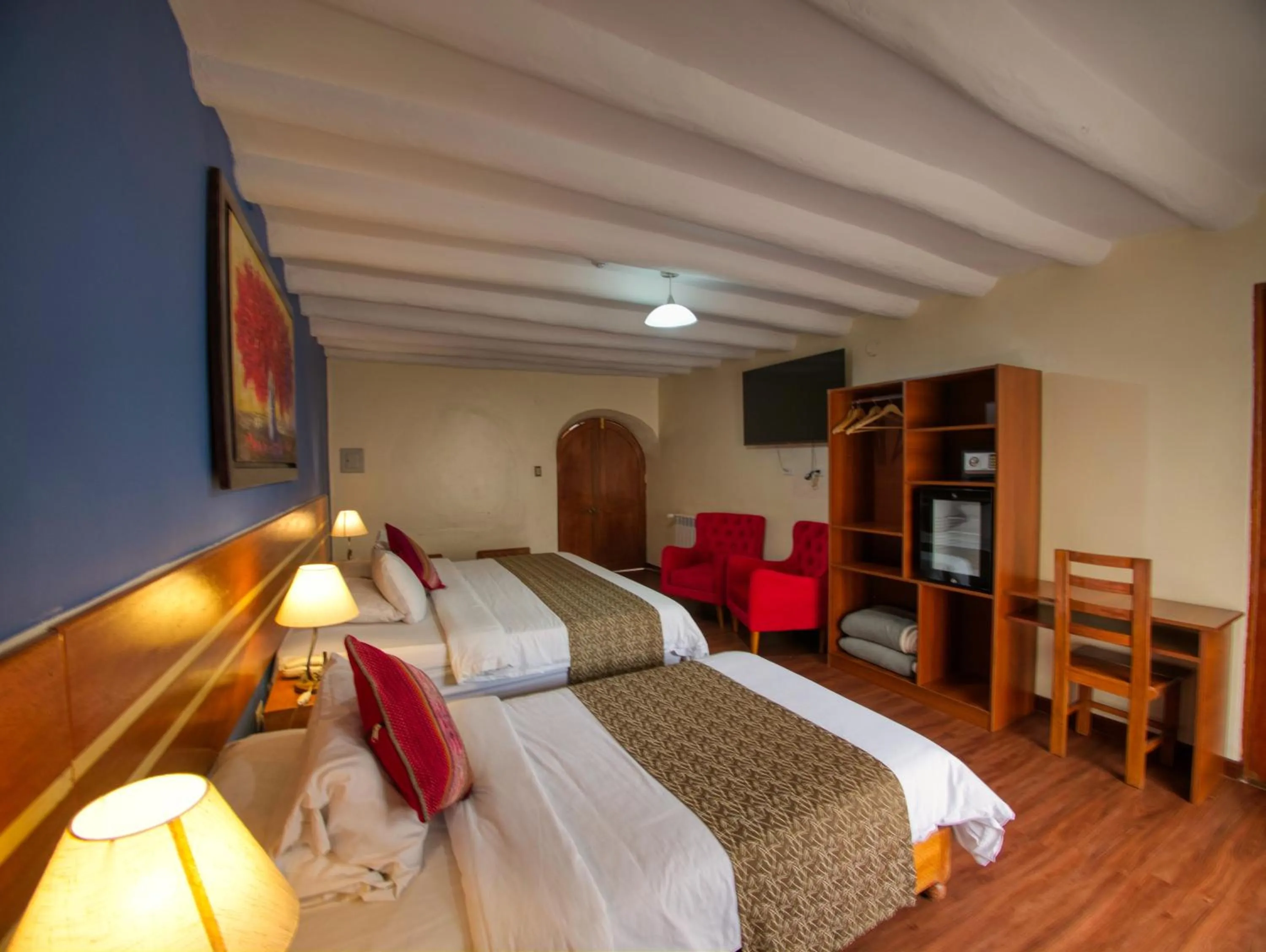 Bed in Sol Ollantay Boutique Hotel