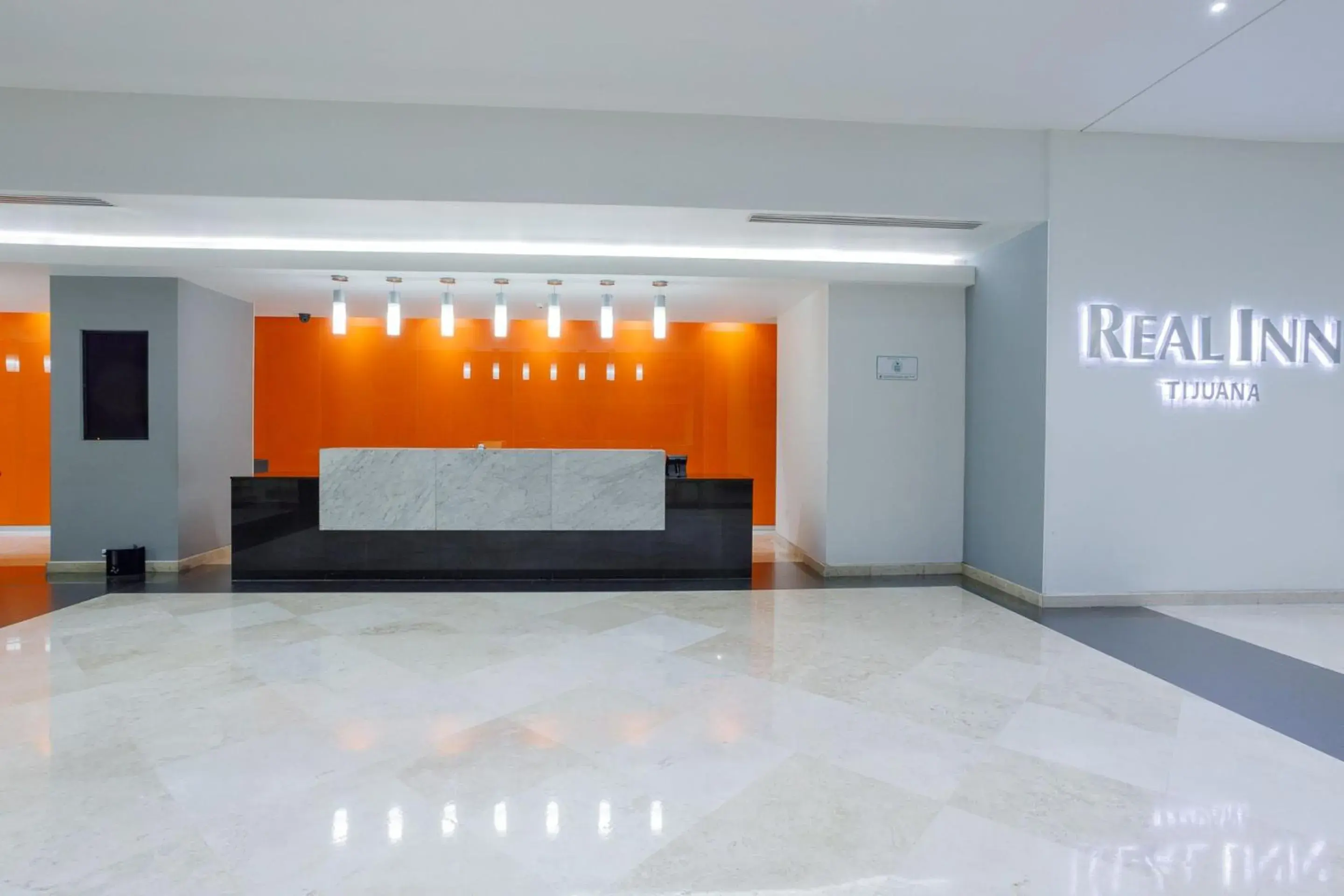Lobby or reception in Real Inn Tijuana by Camino Real Hoteles Lobby or reception in Real Inn Tijuana by Camino Real Hoteles