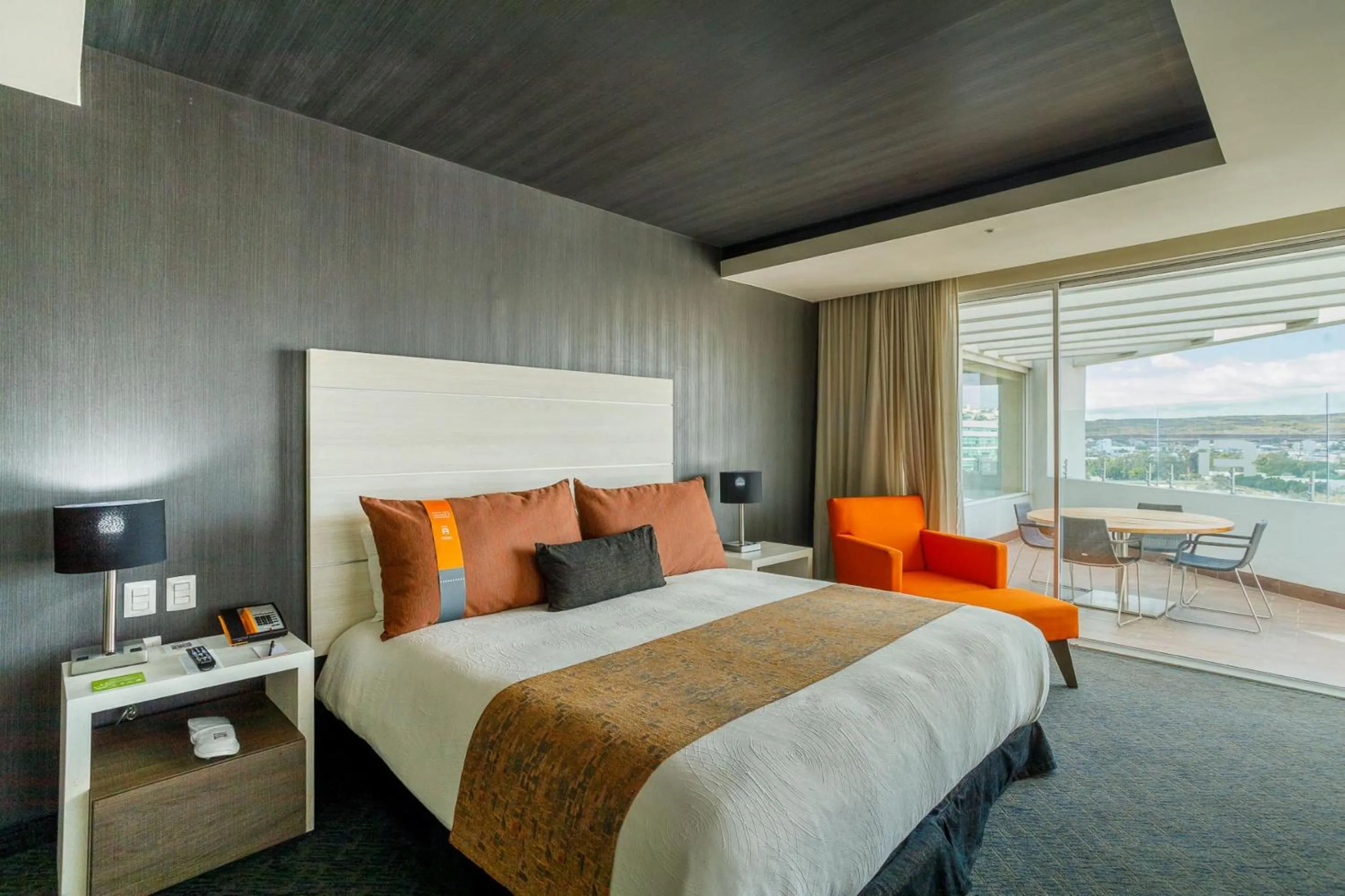 Photo of the whole room, Bed in Real Inn Tijuana by Camino Real Hoteles