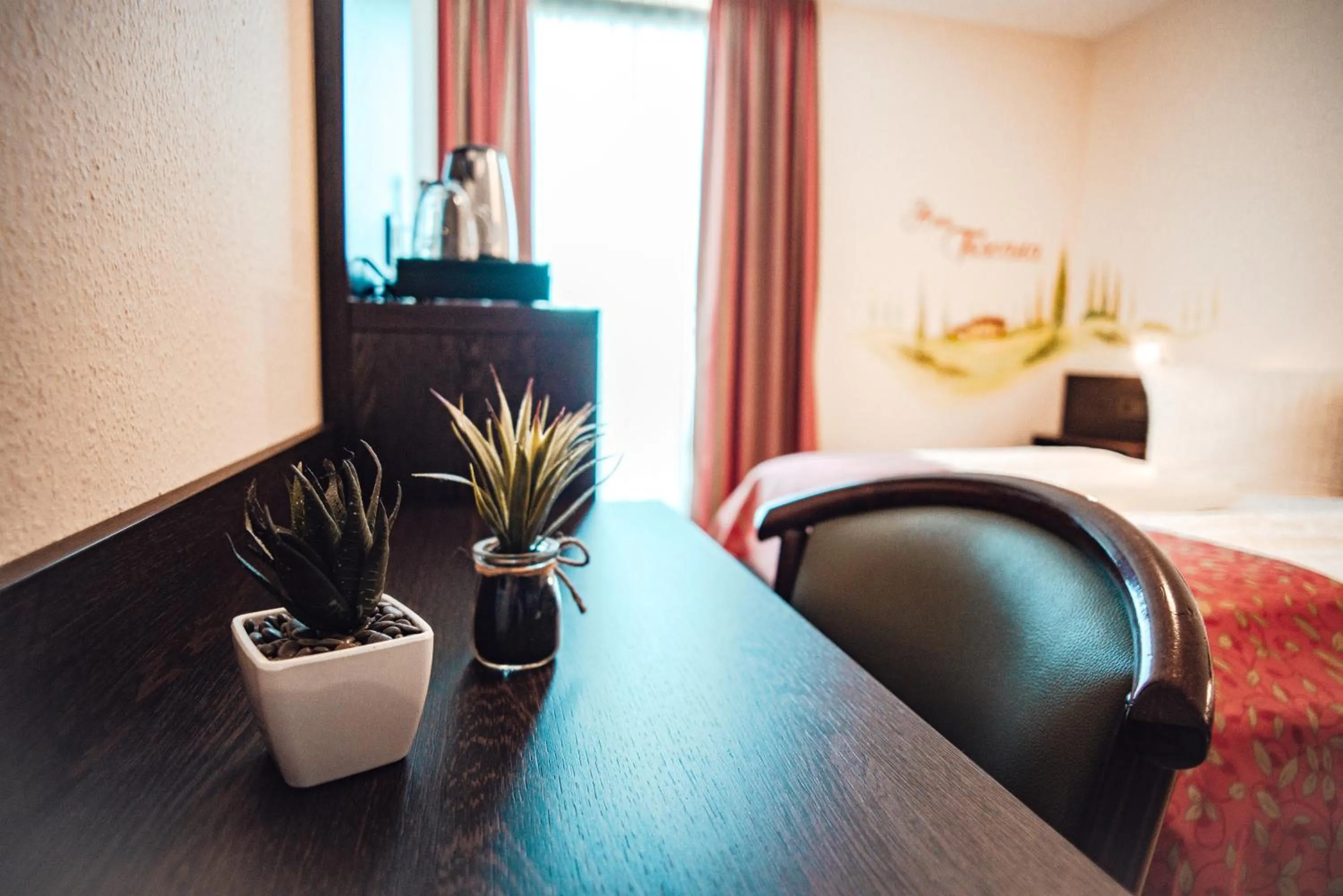 Seating area, Bed in Hotel La Toscana Nähe Europapark und Rulantica