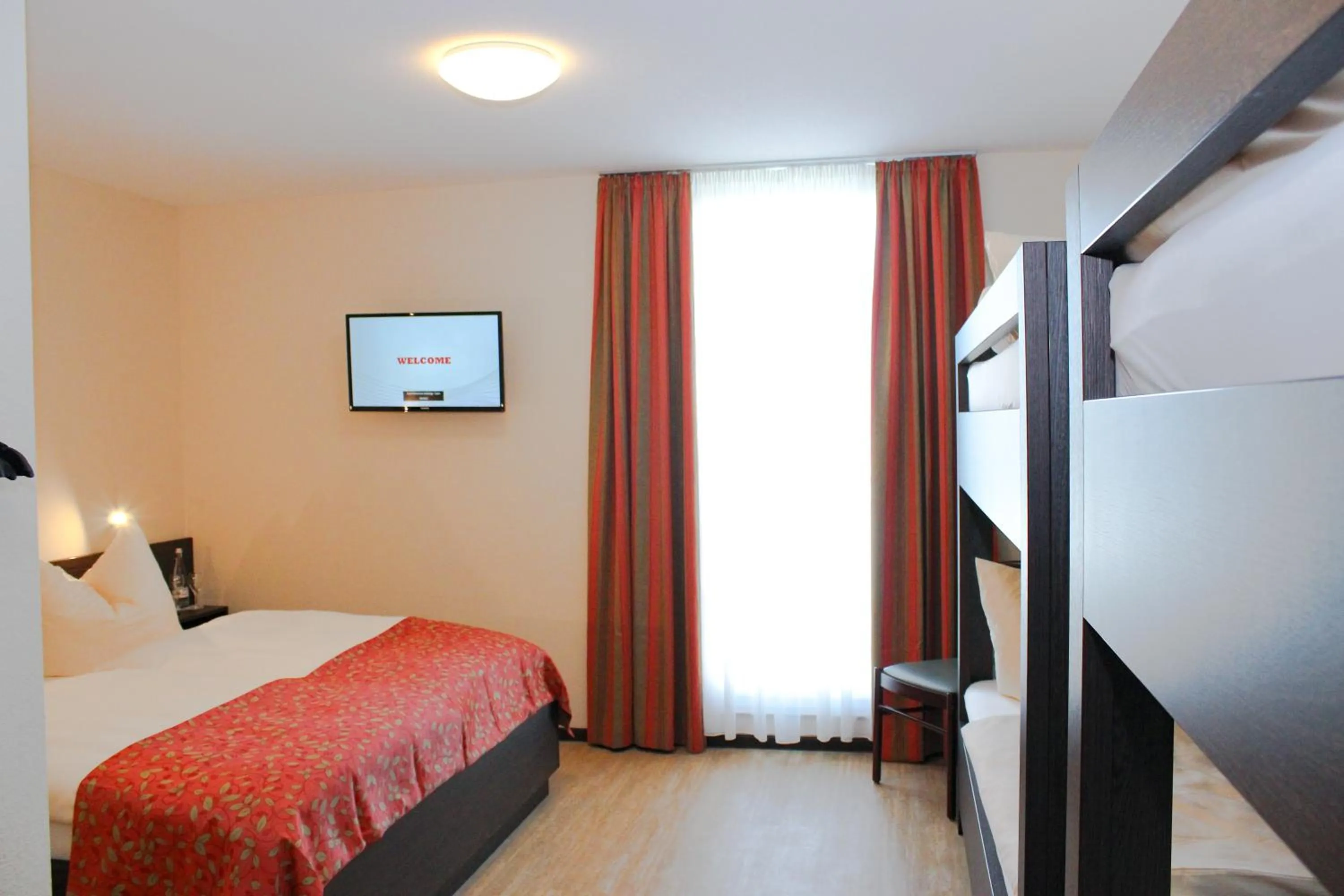 Photo of the whole room, Bed in Hotel La Toscana Nähe Europapark und Rulantica