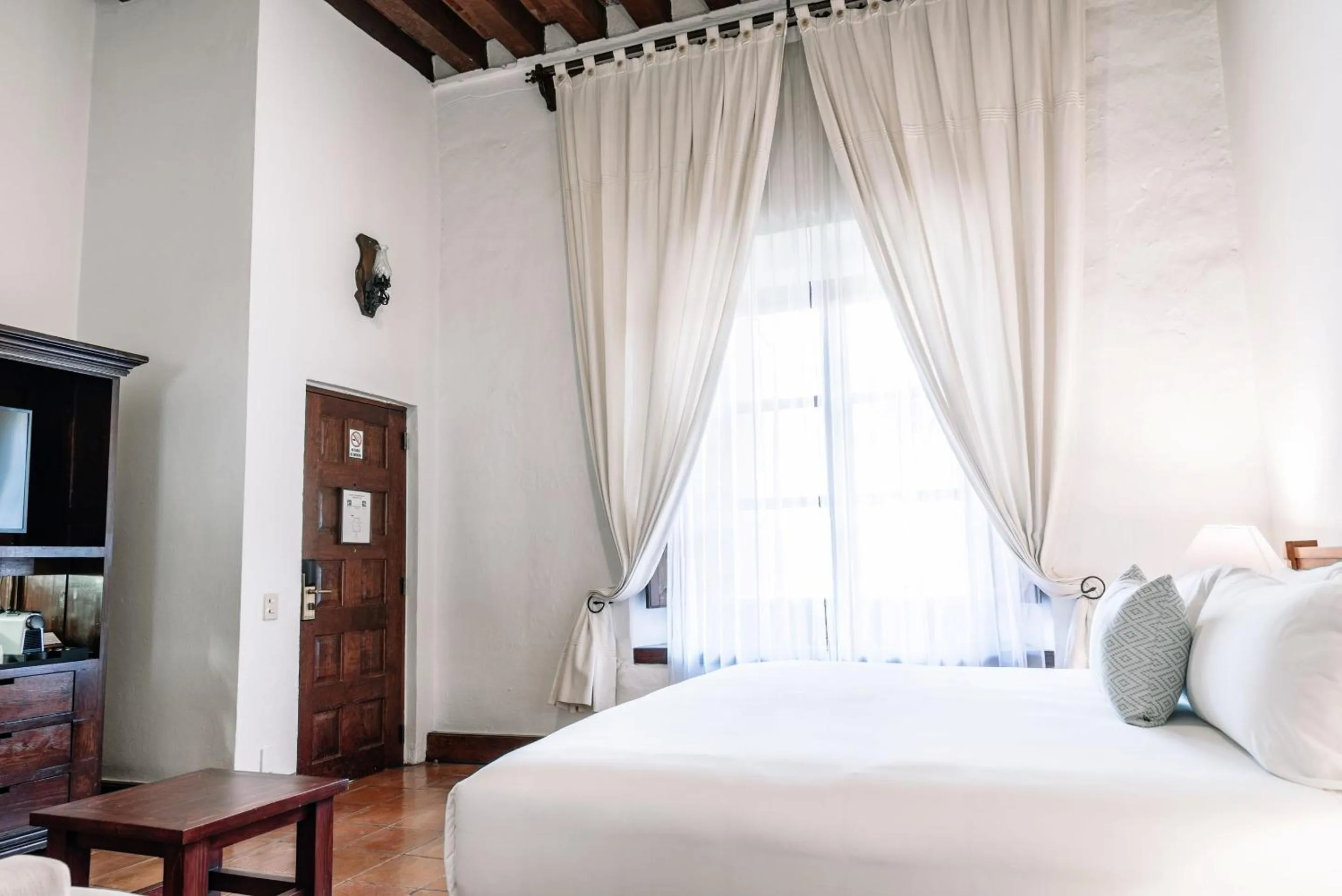 Bedroom, Bed in Quinta Real Oaxaca