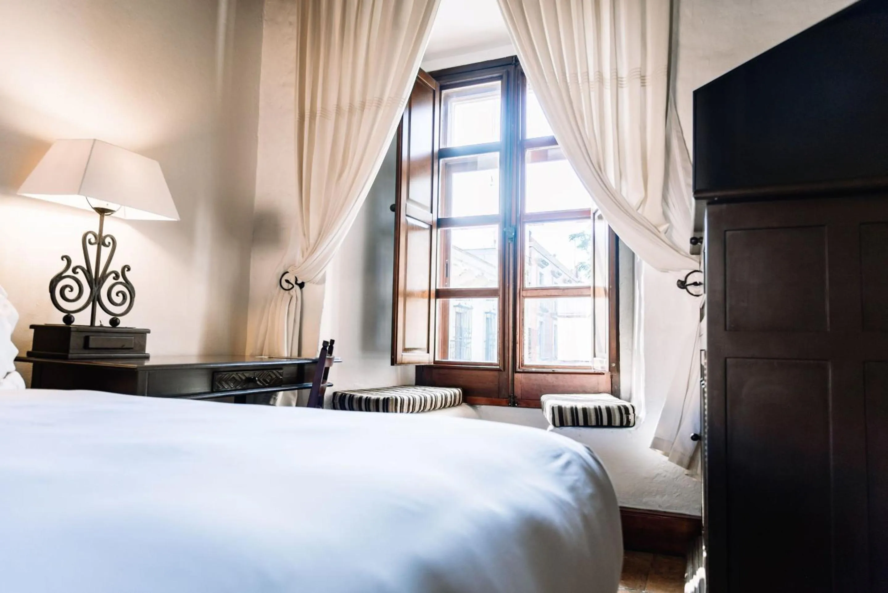 Bedroom, Bed in Quinta Real Oaxaca