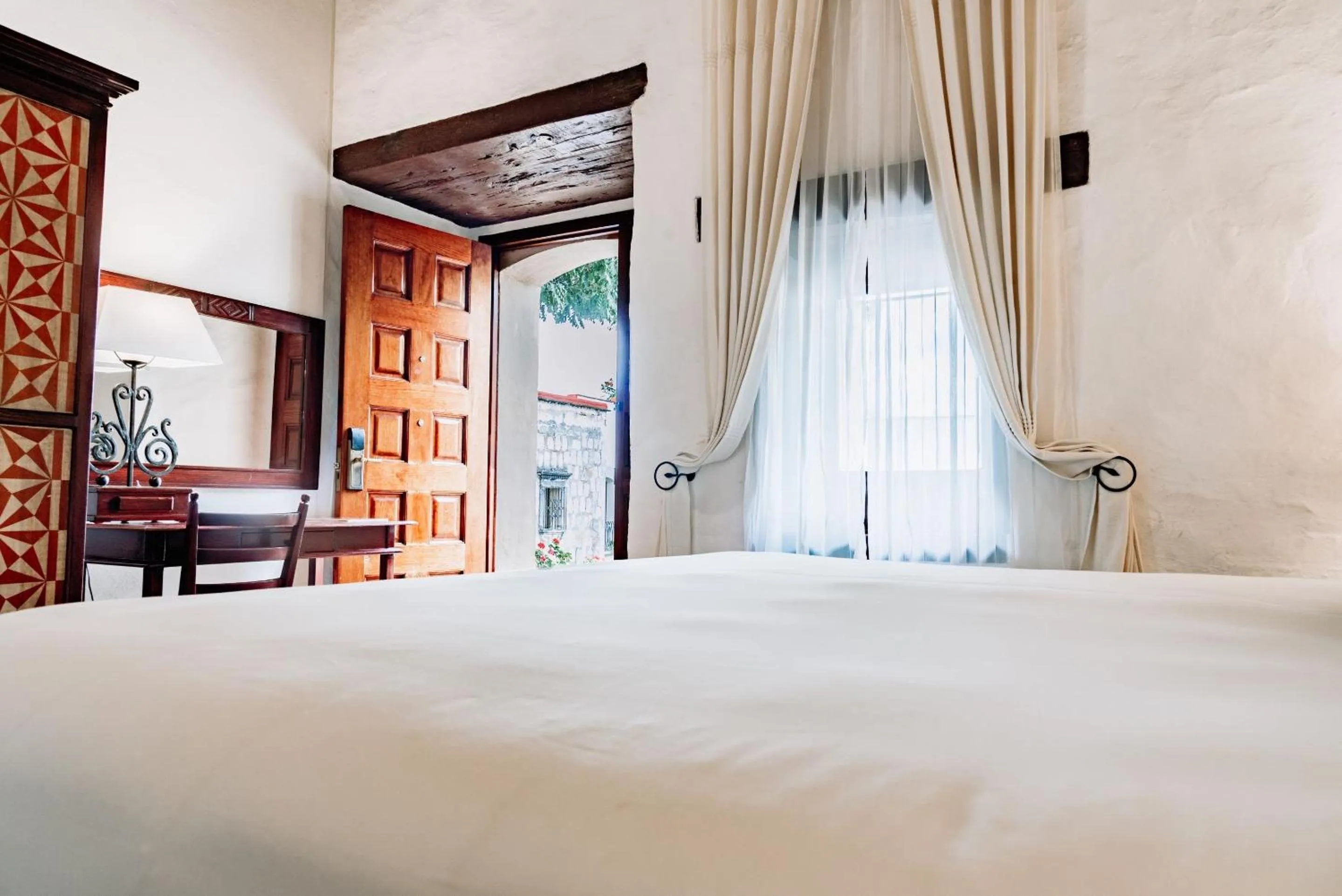 Bedroom, Bed in Quinta Real Oaxaca