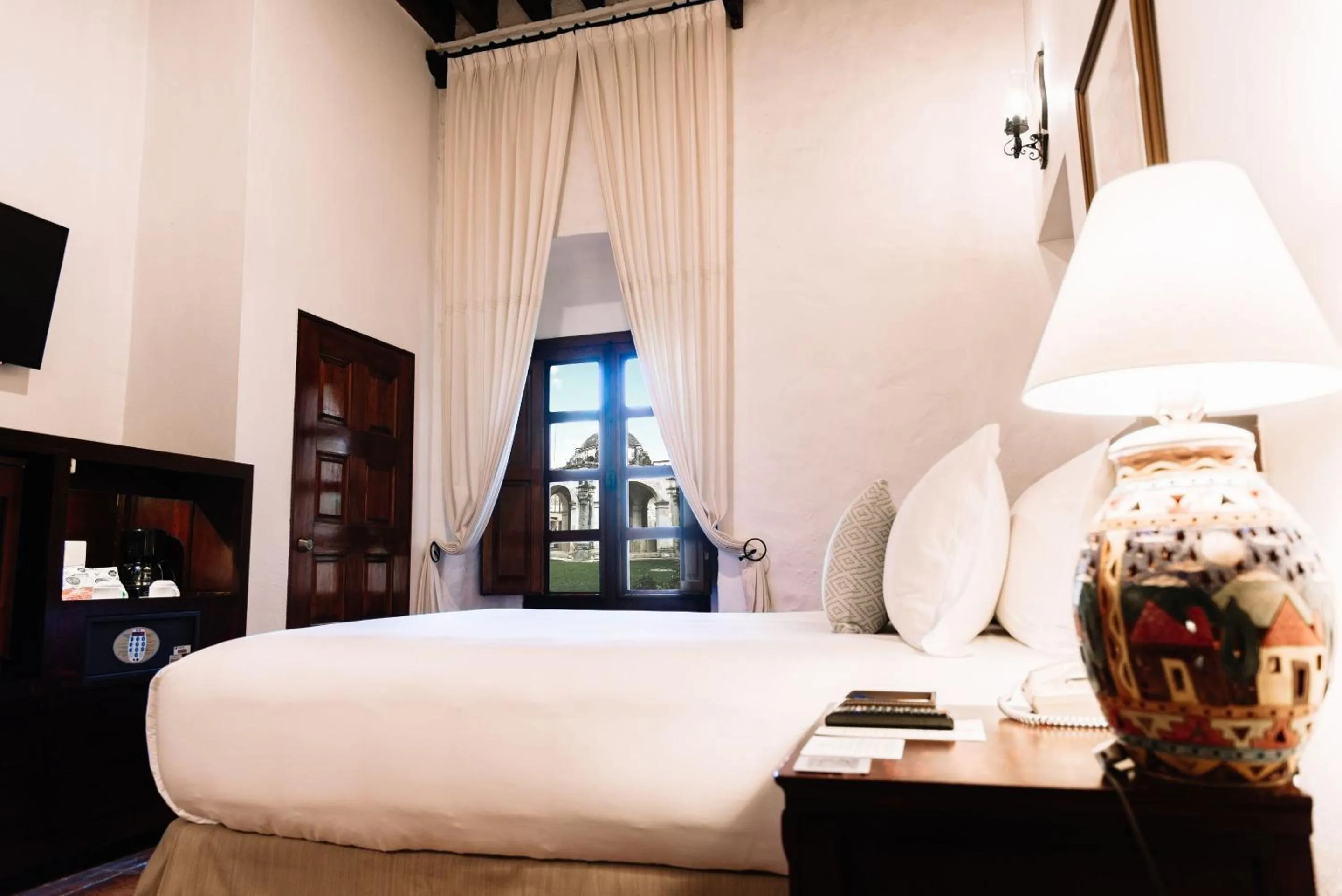 Bedroom, Bed in Quinta Real Oaxaca