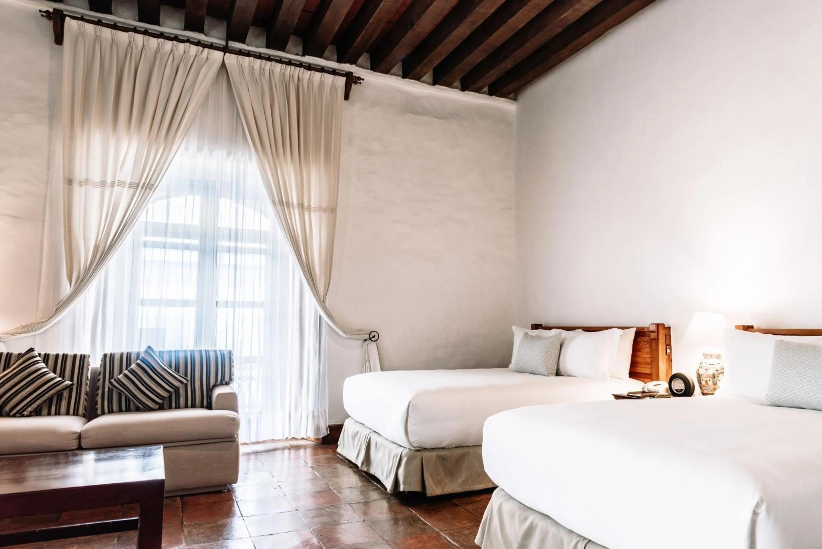 Bedroom, Bed in Quinta Real Oaxaca