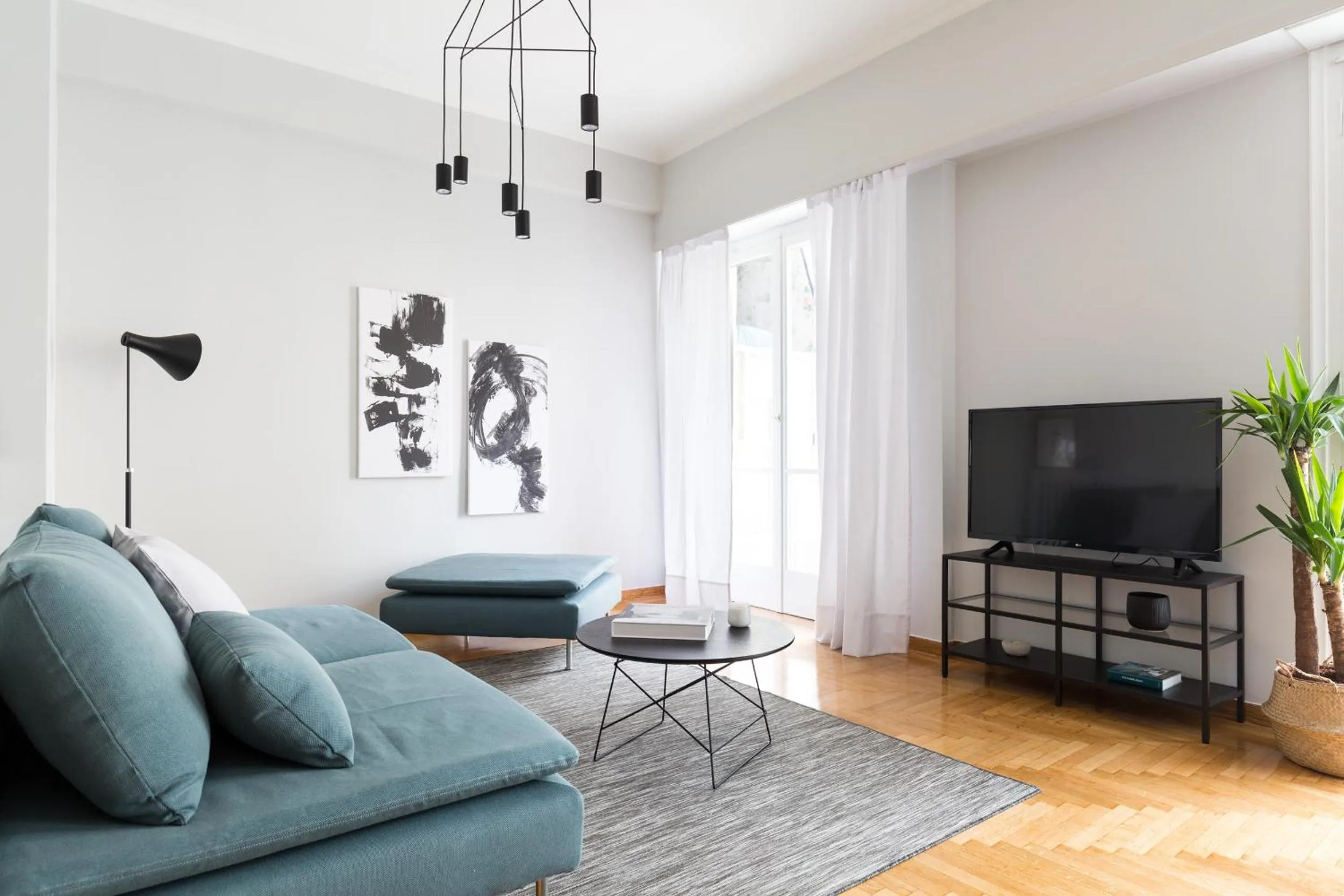 Living room in Acropolis Core Bright & Modern Apartment by UPSTREET