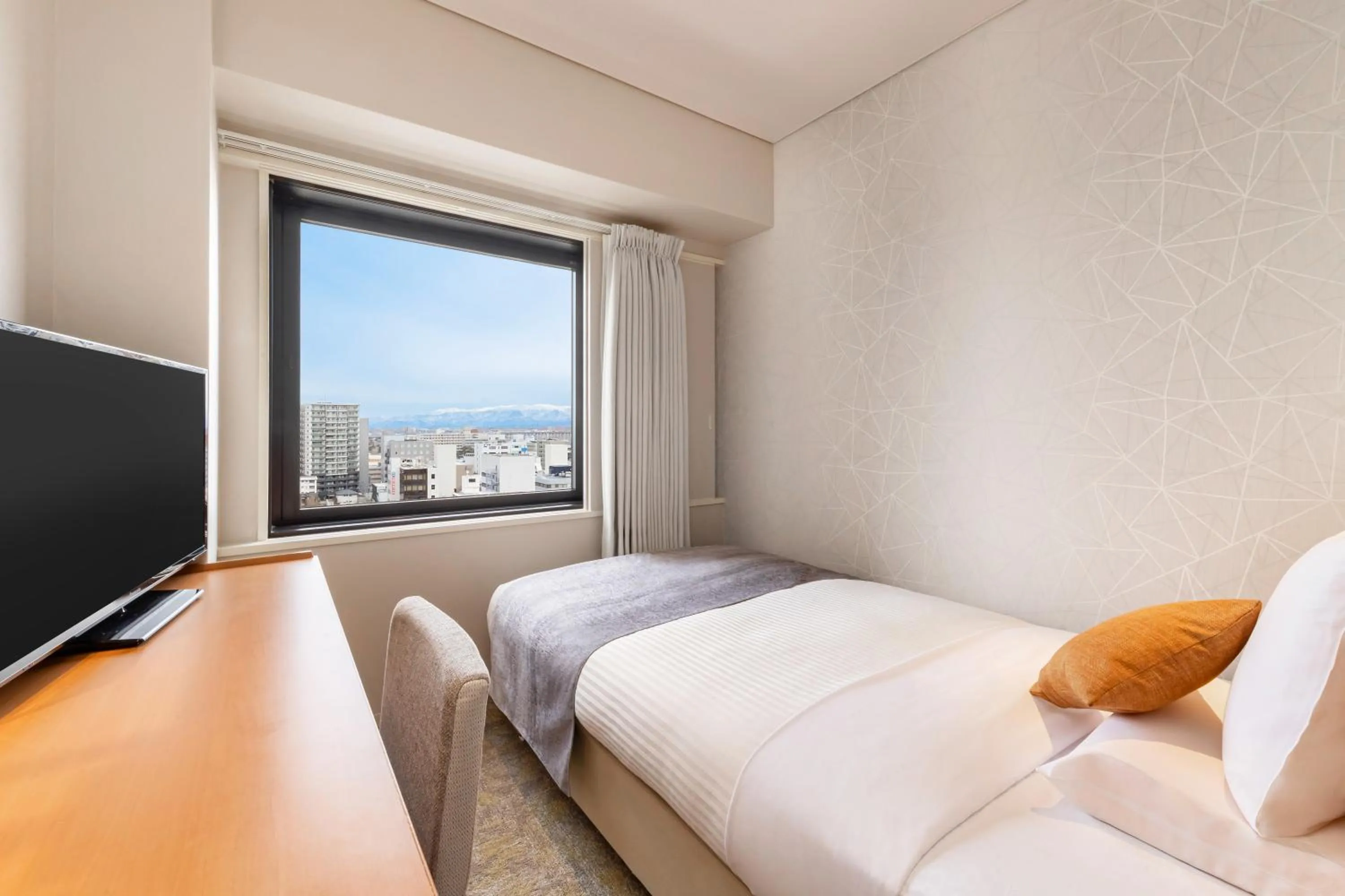 Bed in Art Hotel Niigata Station