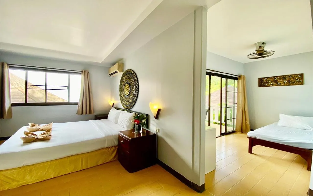 Bed in Koh Hai Fantasy Resort & Spa