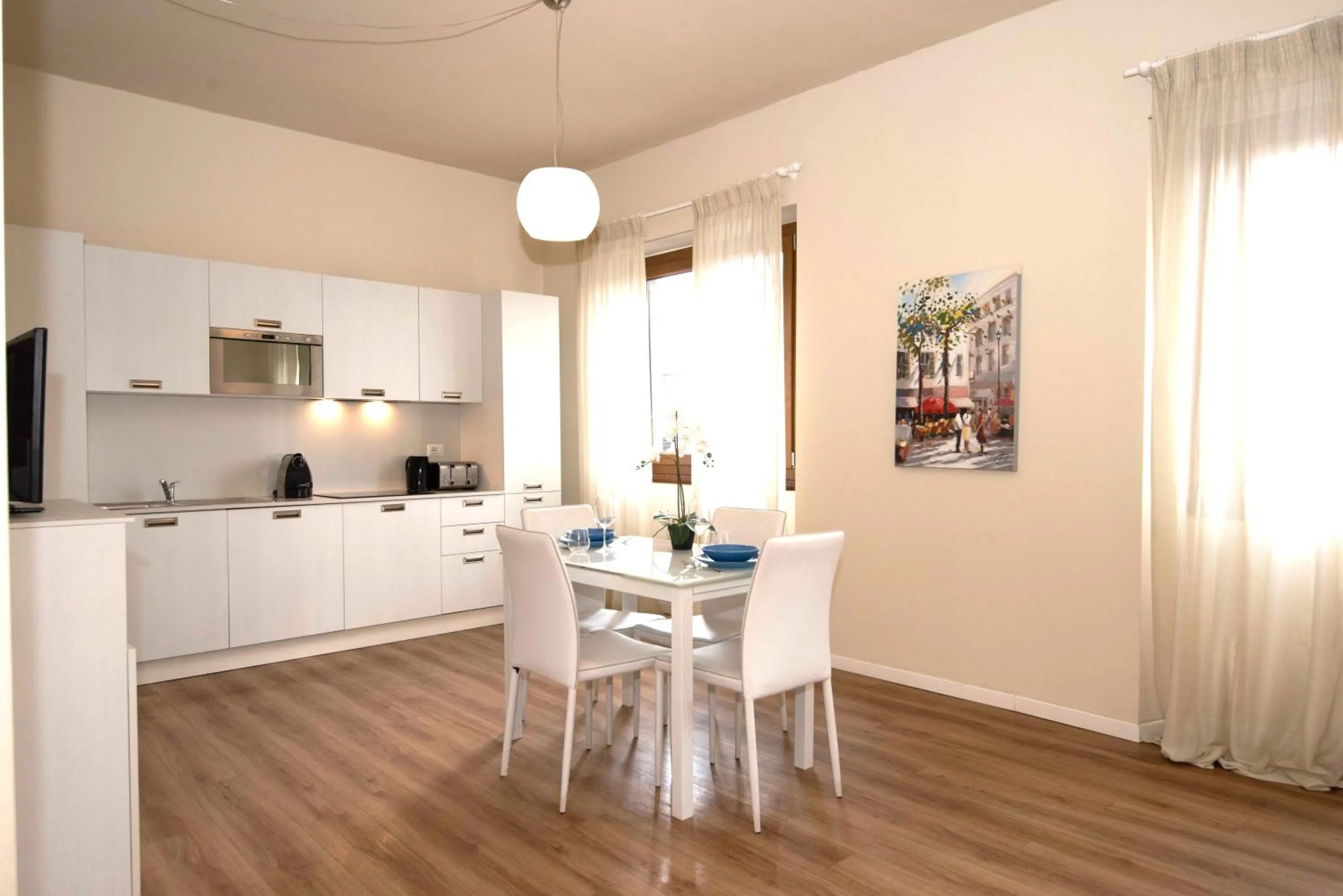 Dining area in Donatello Apartments by Firenze Prestige
