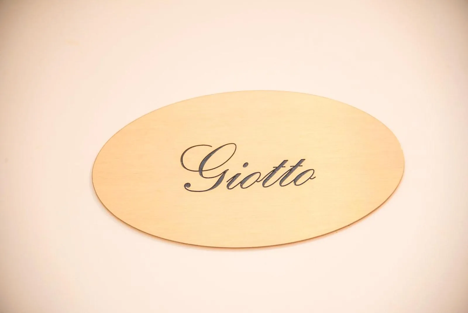 Property logo or sign in Donatello Apartments by Firenze Prestige