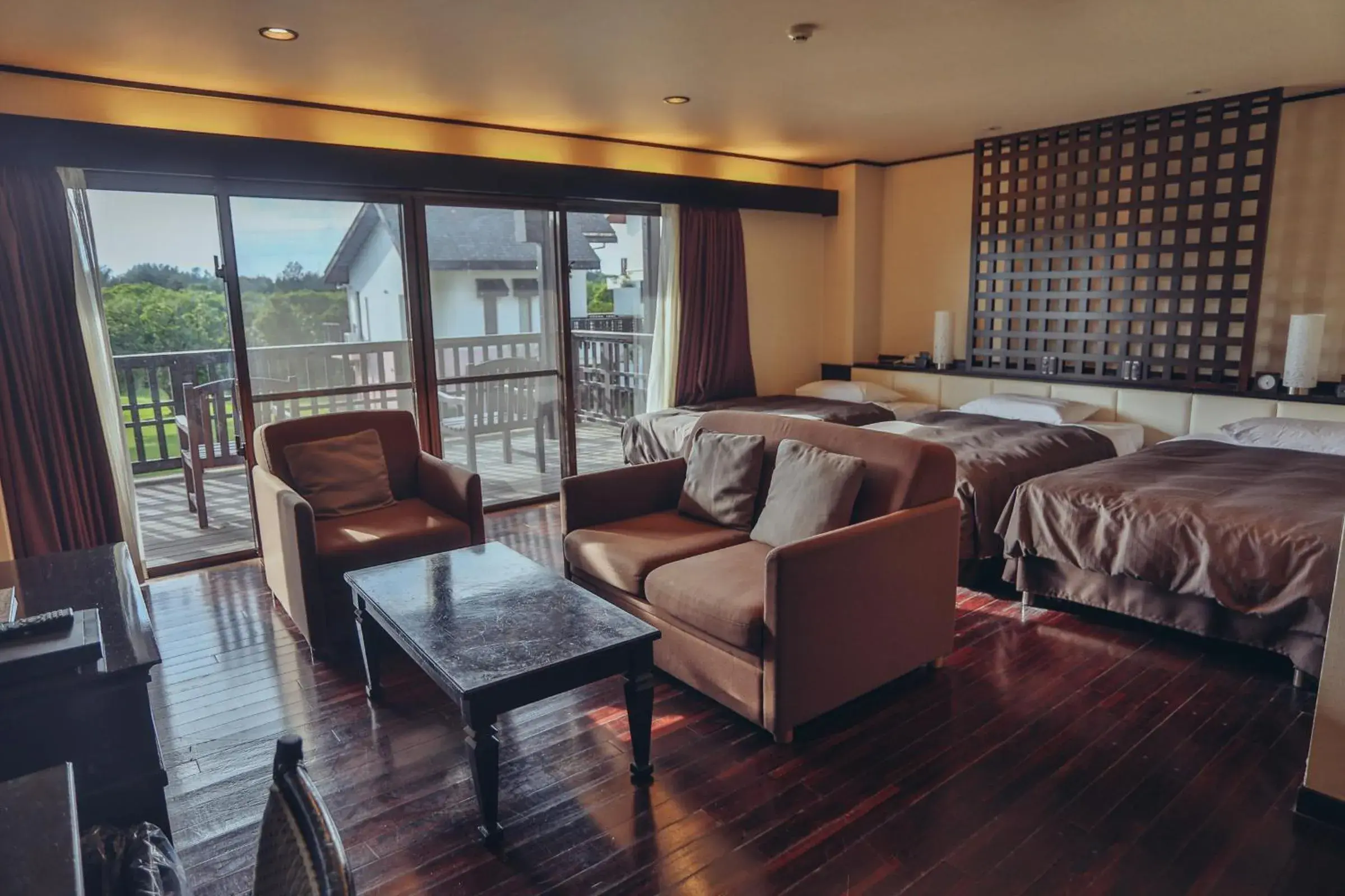 Garden view, Bed in Okuma Private Beach & Resort Garden view, Bed in Okuma Private Beach & Resort