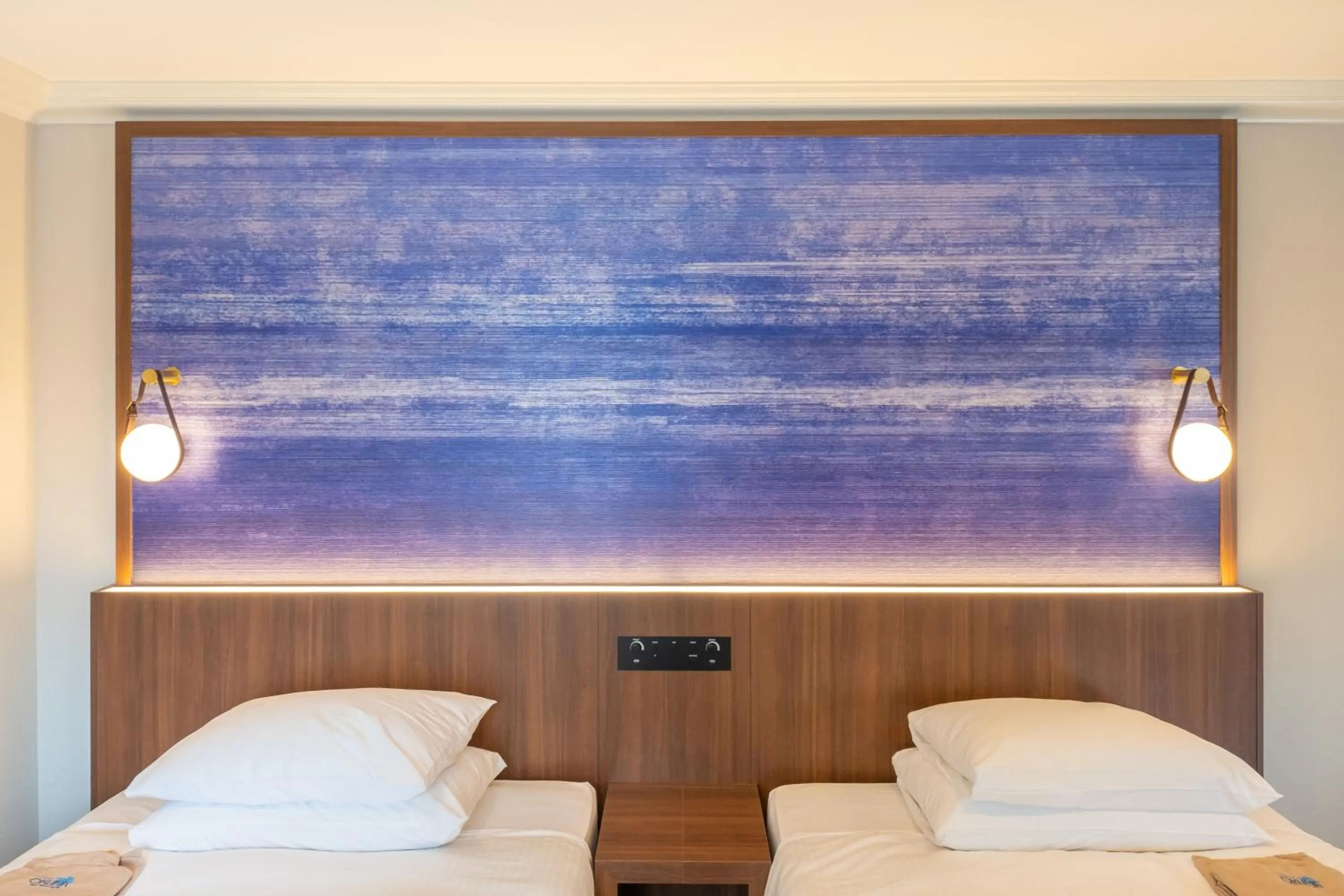 Bed in Okuma Private Beach & Resort