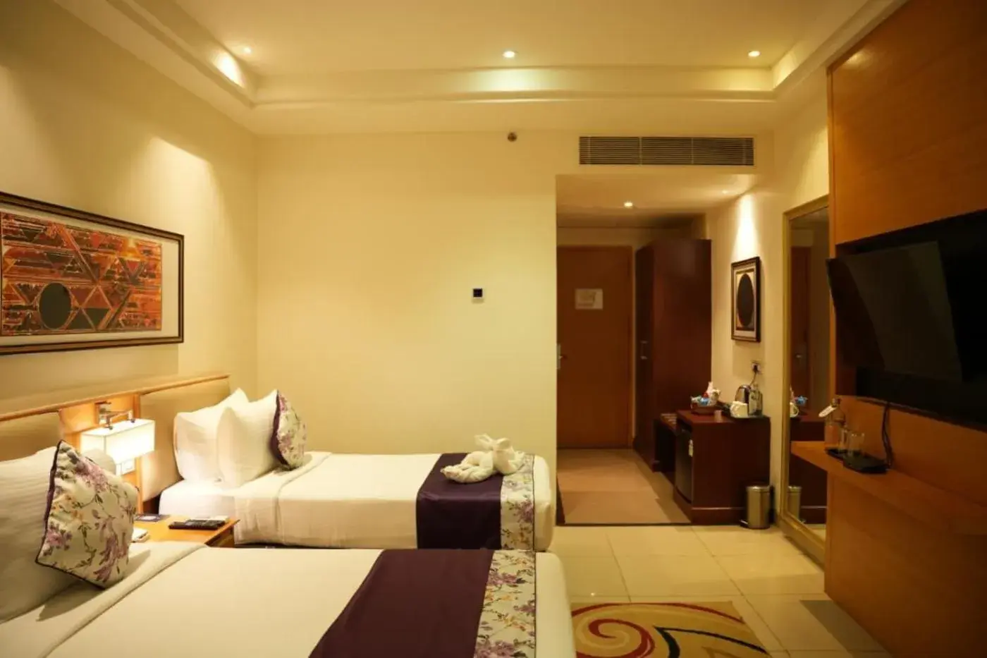 Bedroom, Bed in Royal Orchid Central, Shimoga Bedroom, Bed in Royal Orchid Central, Shimoga