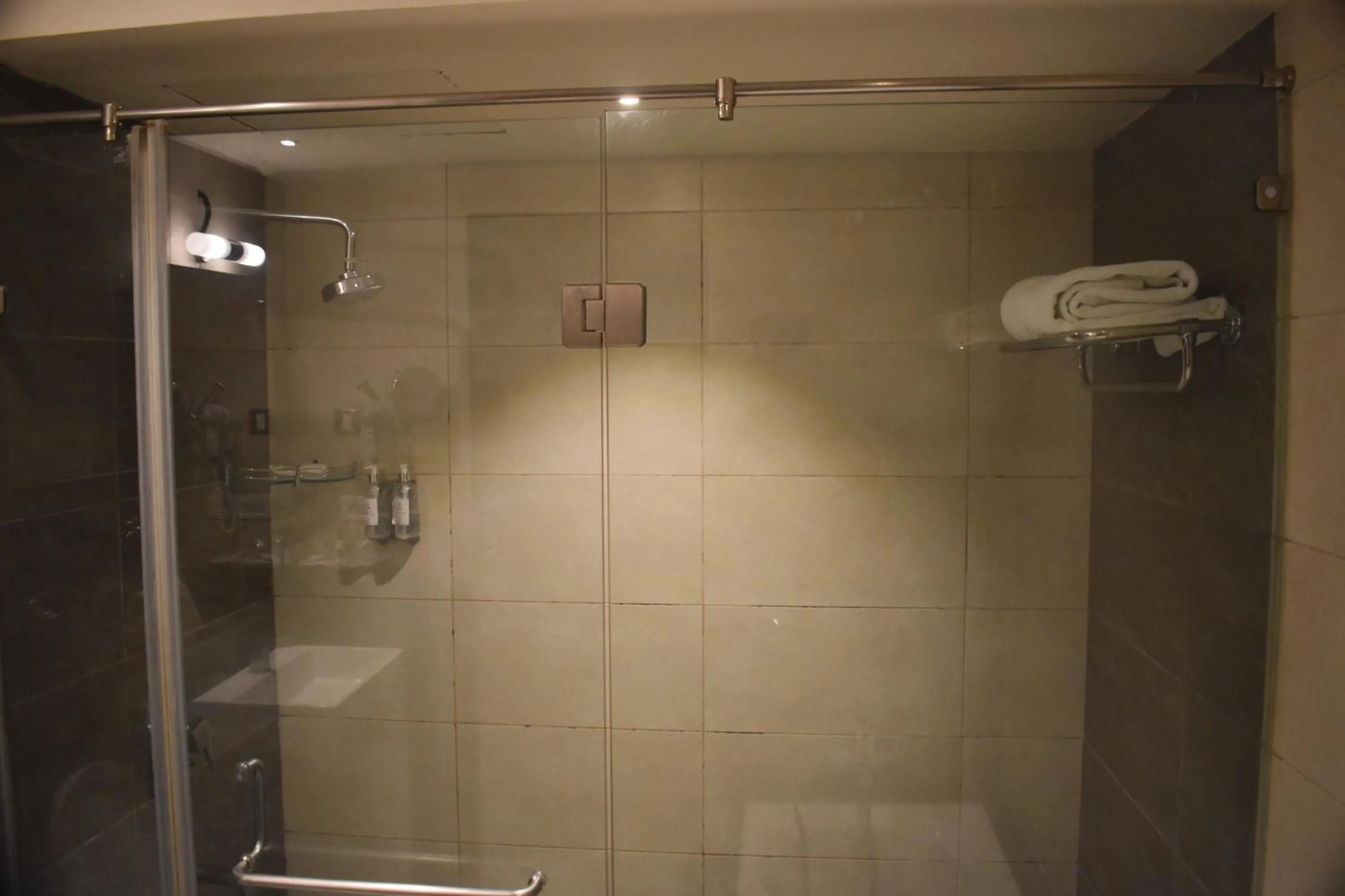 Shower in Royal Orchid Central, Shimoga