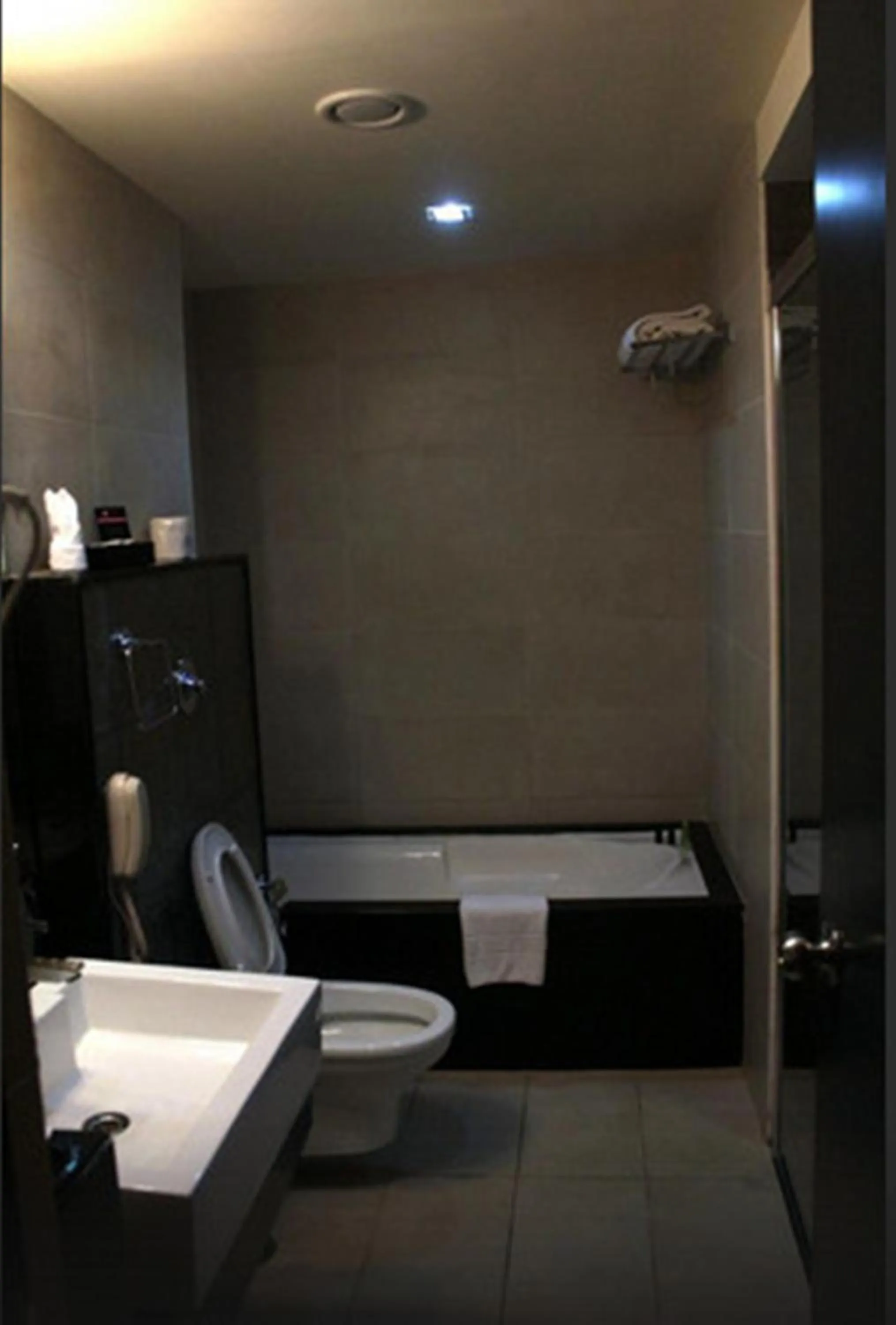 Shower in Royal Orchid Central, Shimoga