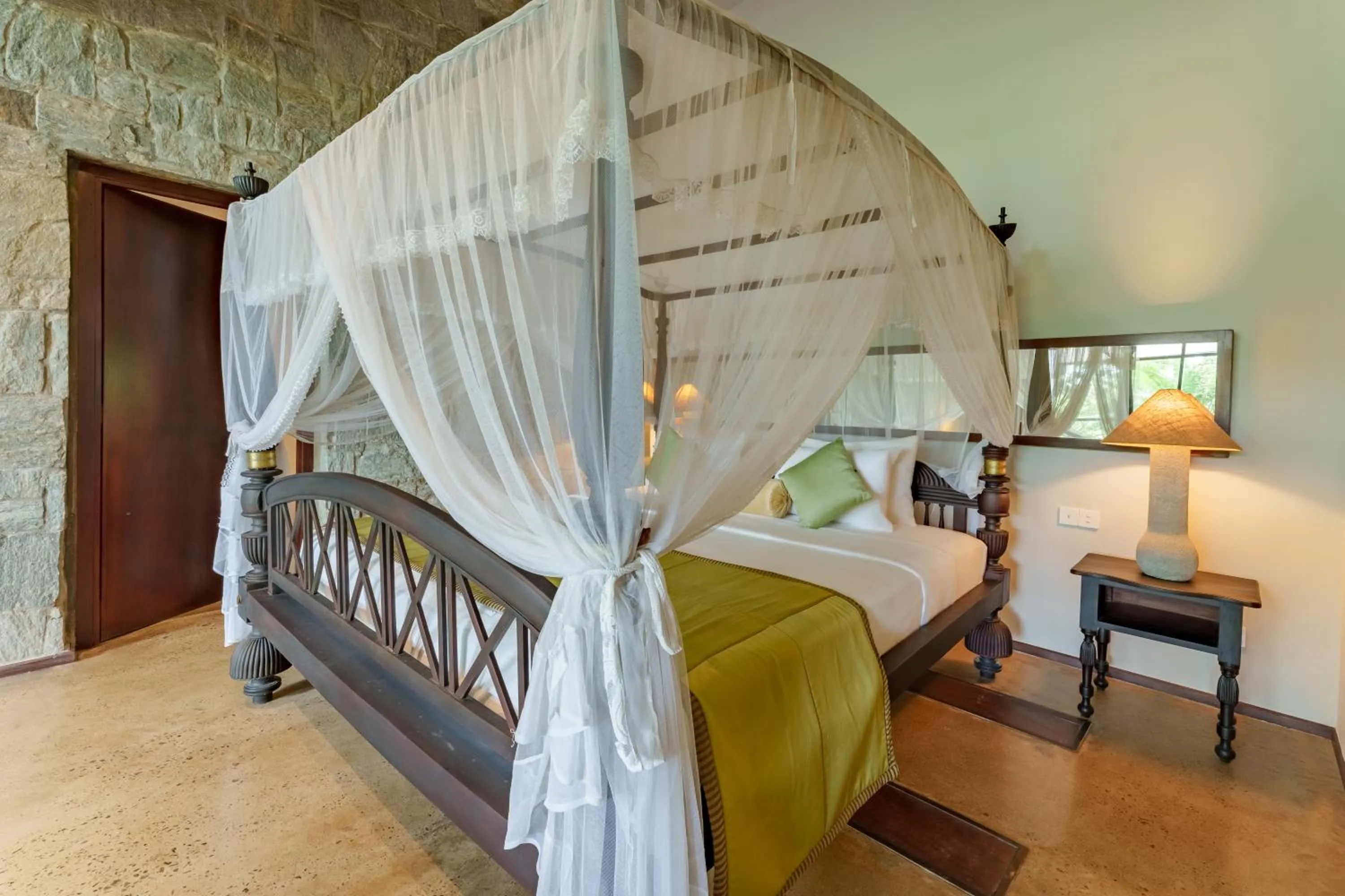 Bed in Ayugiri Ayurveda Wellness Resort Sigiriya